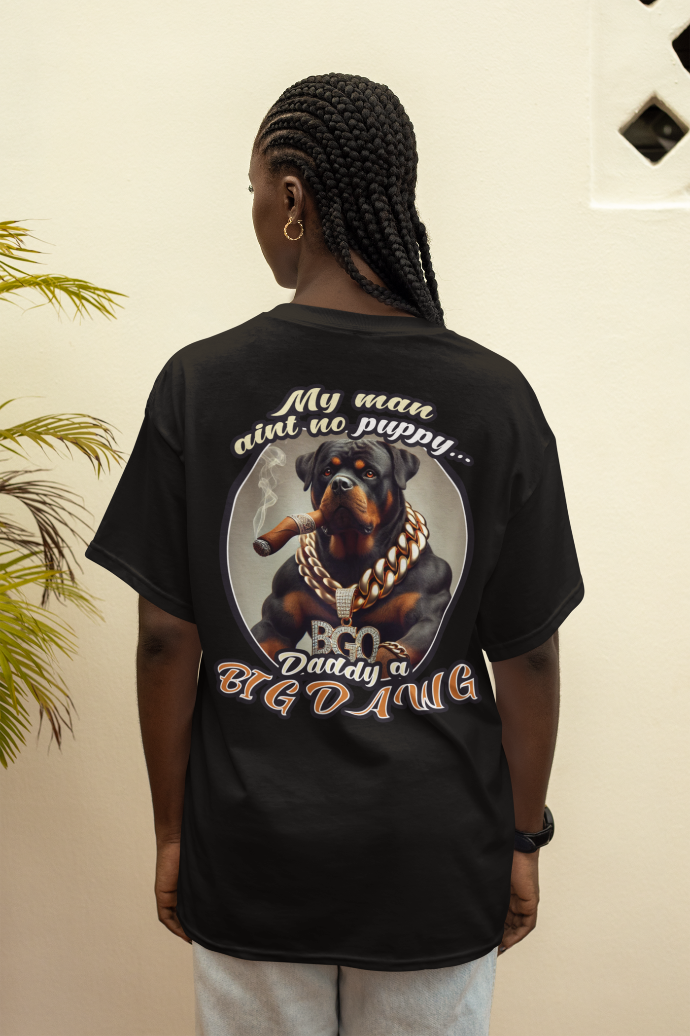 back-view-mockup-featuring-a-woman-with-braided-hair-wearing-a-t-shirt-m37948.webp