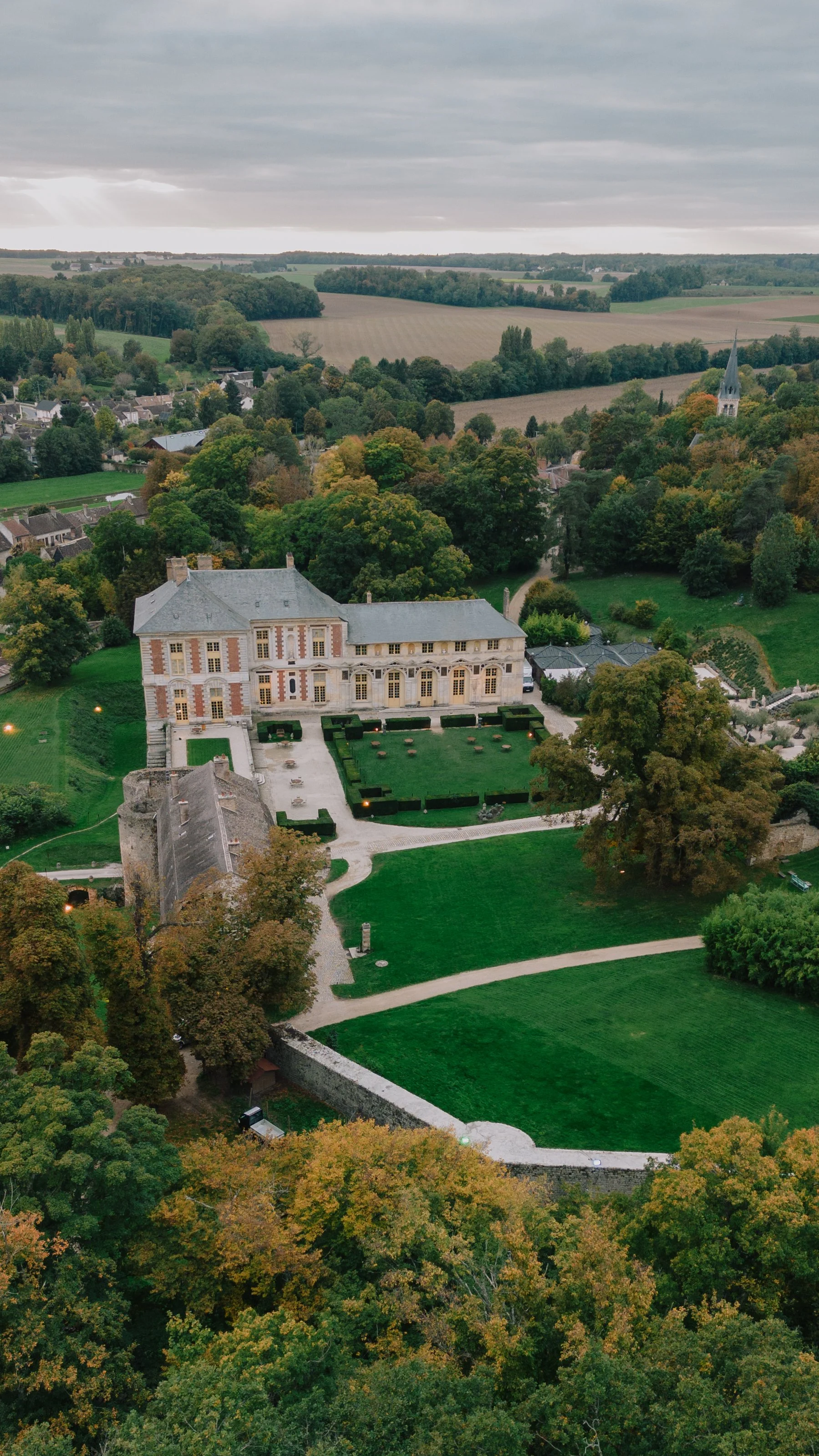 Aerial view of a luxury wedding venue estate surrounded by nature in Europe