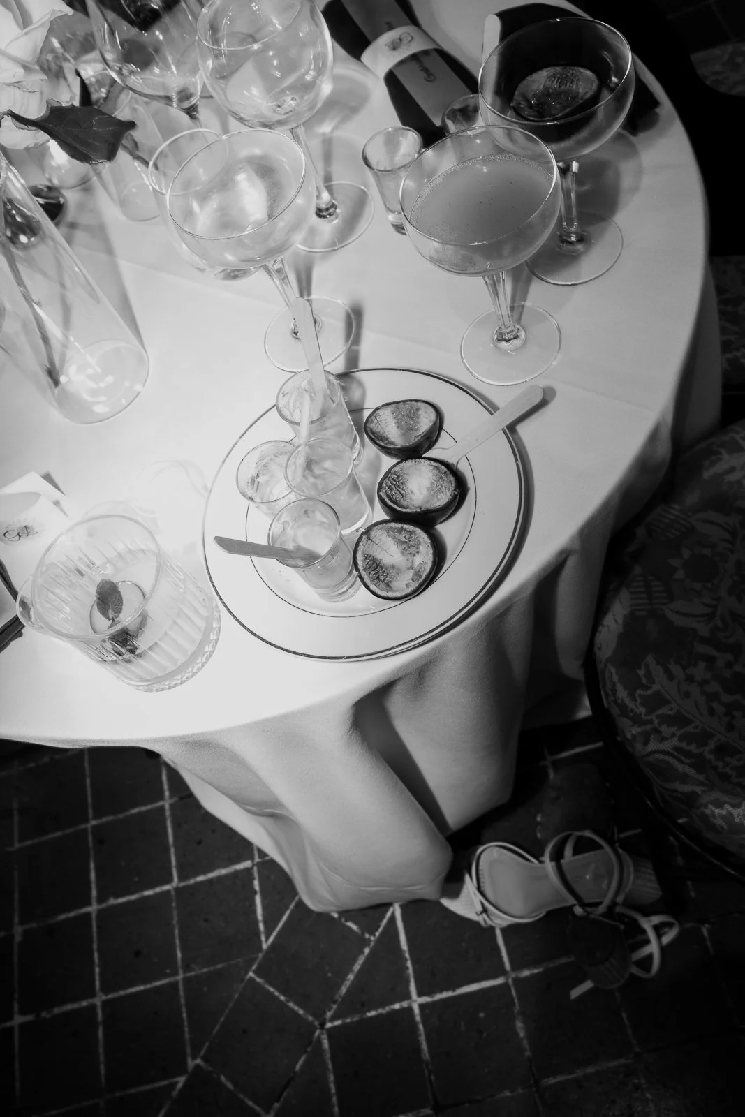 Elegant wedding table details during a reception in Portugal captured in black and white