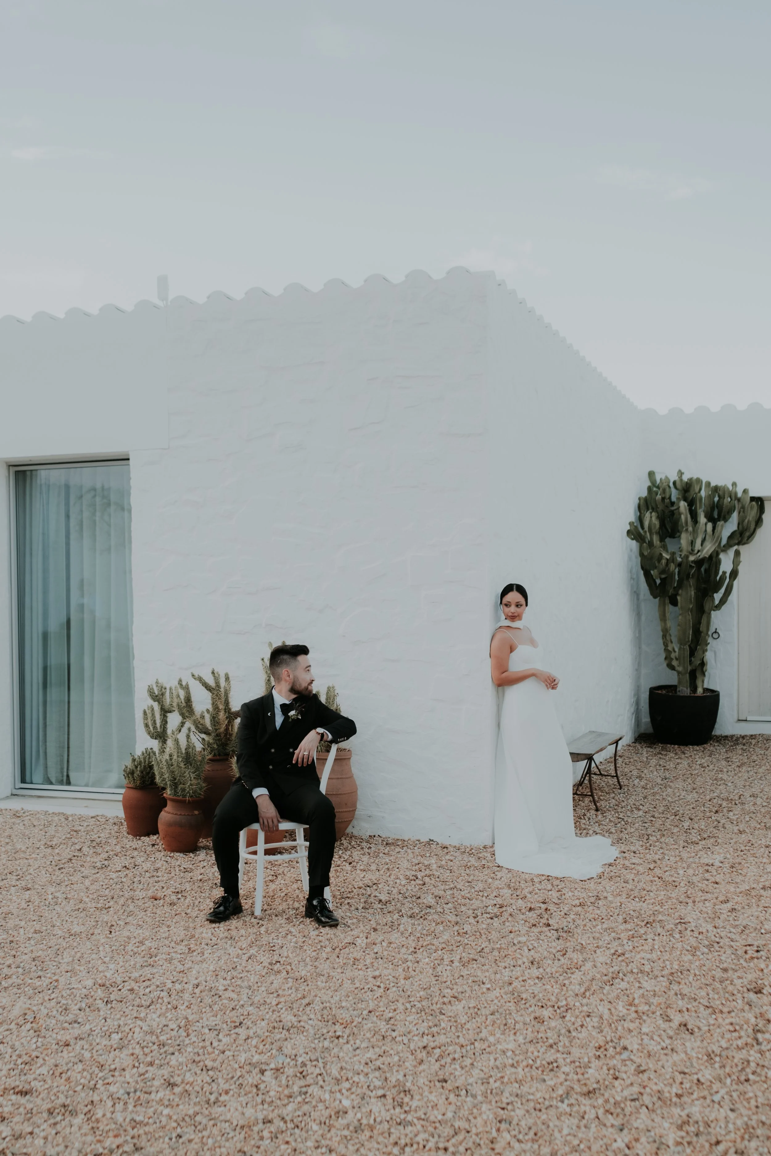 Modern wedding couple in Portugal with minimalist architecture and soft neutral tones