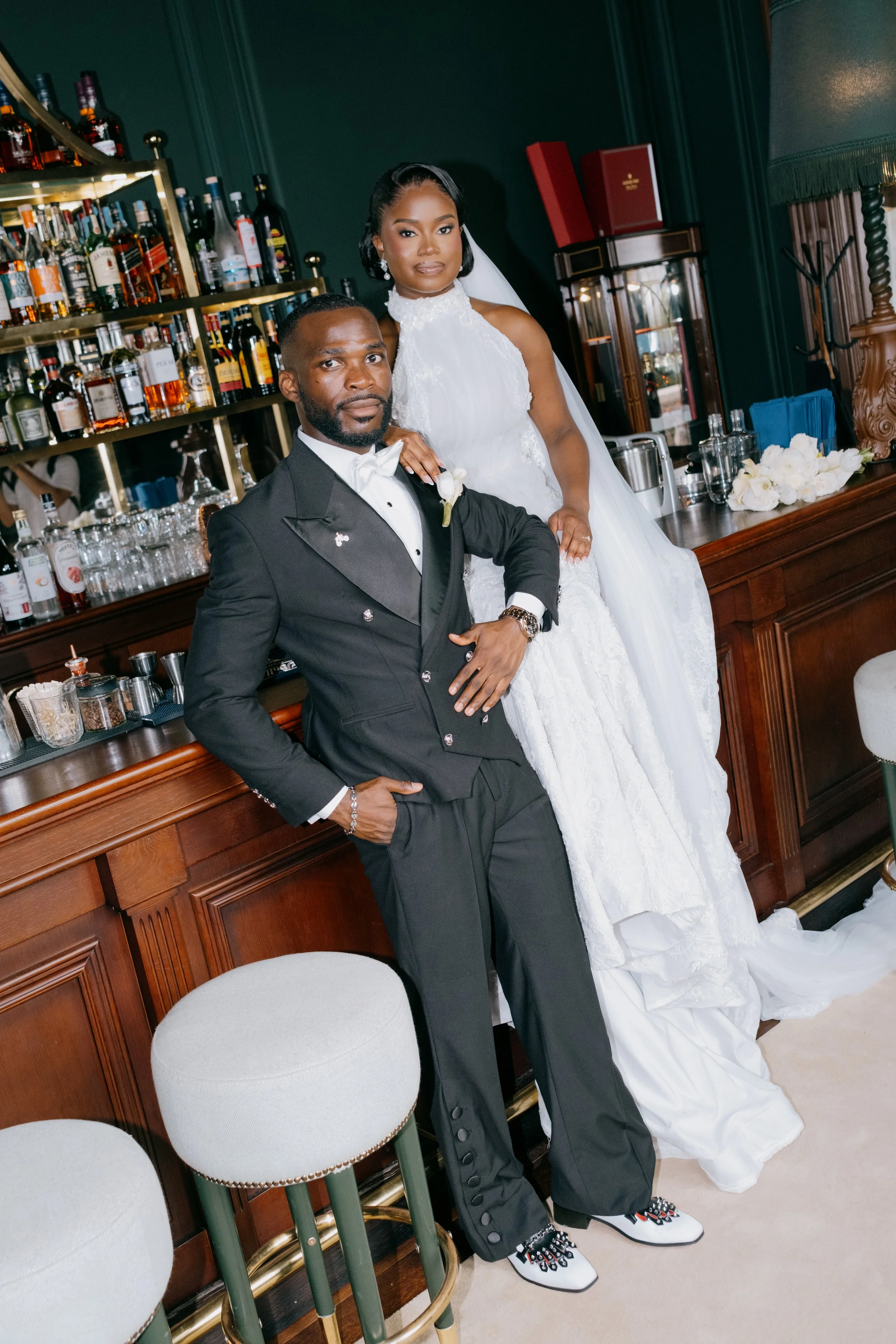 Elegant couple during a luxury wedding in Portugal at a stylish bar setting