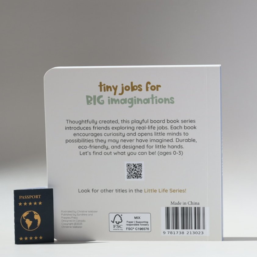 The back cover of a children's board book titled 'tiny jobs for BIG imaginations,' with a QR code, FSC certification, and barcode. A miniature passport is placed in front of the book.