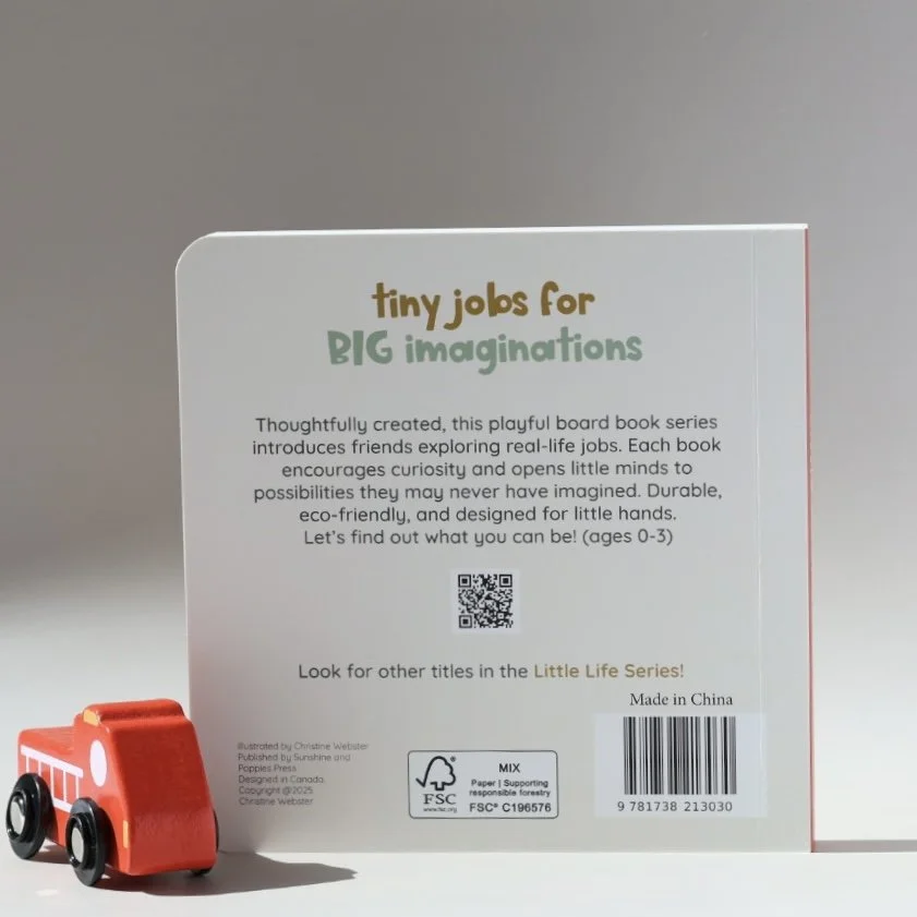 Back of a children's board book titled 'tiny jobs for BIG imaginations' with a small red toy fire truck placed nearby.