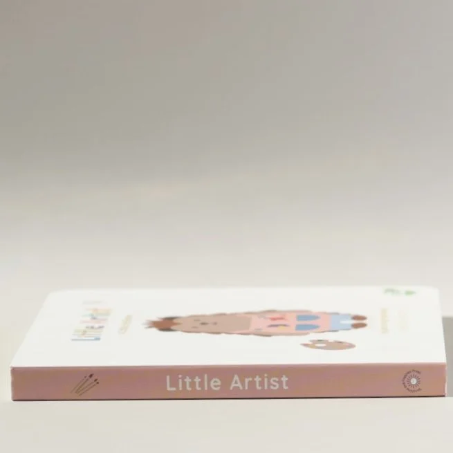 A children's coloring book titled 'Little Artist' lying flat on a white surface with a plain light grey background.