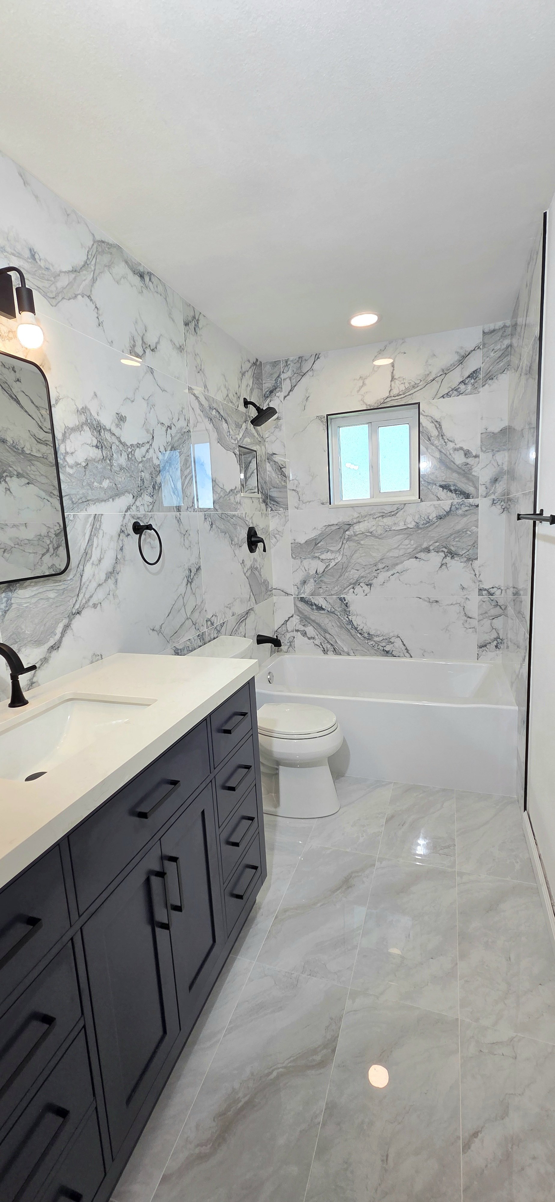 bathroom remodeling Palm Coast FL — shower tile — wall to floor