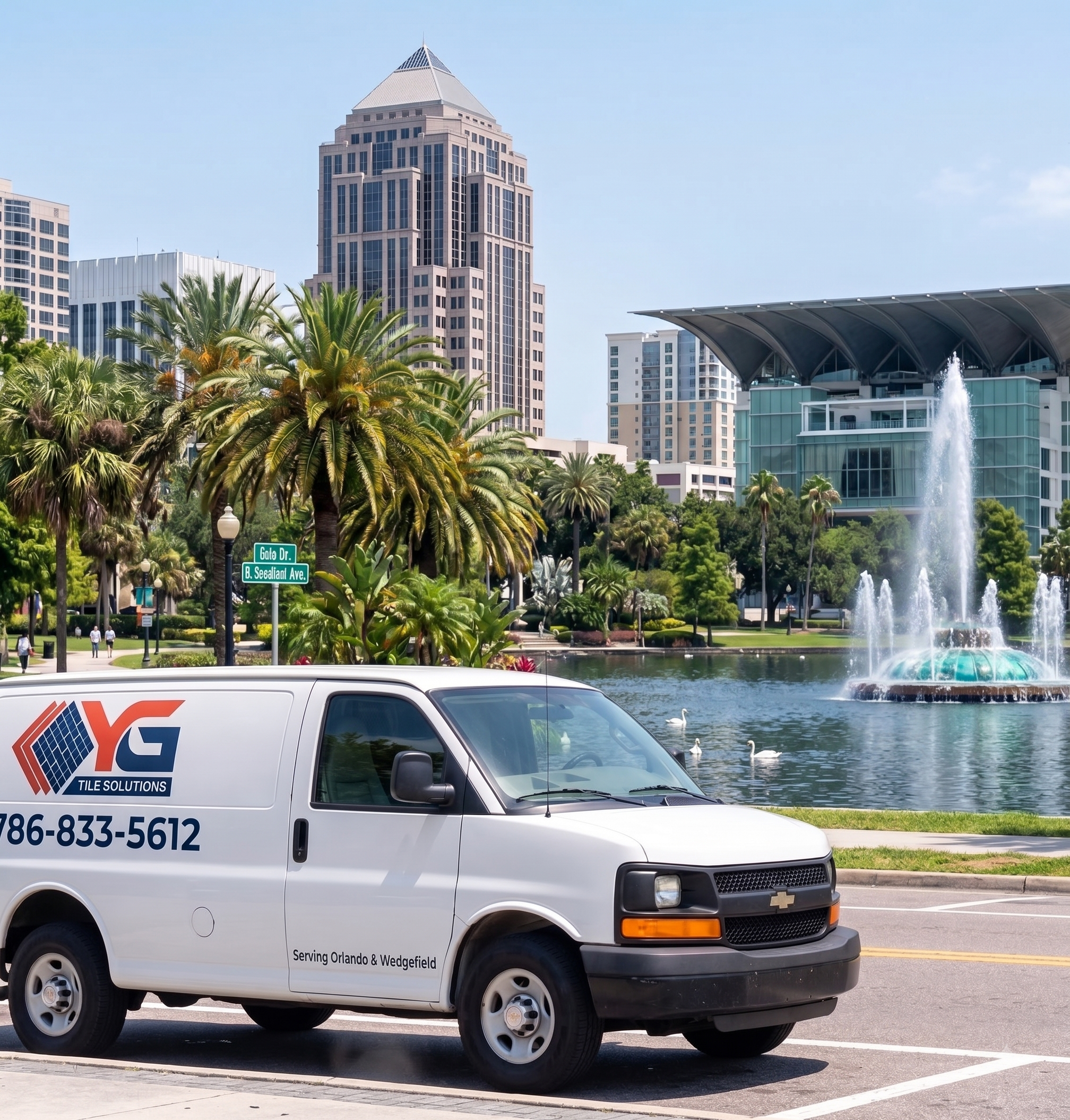 YG Tile Solution van in front of Downtown Orlando landmarks.