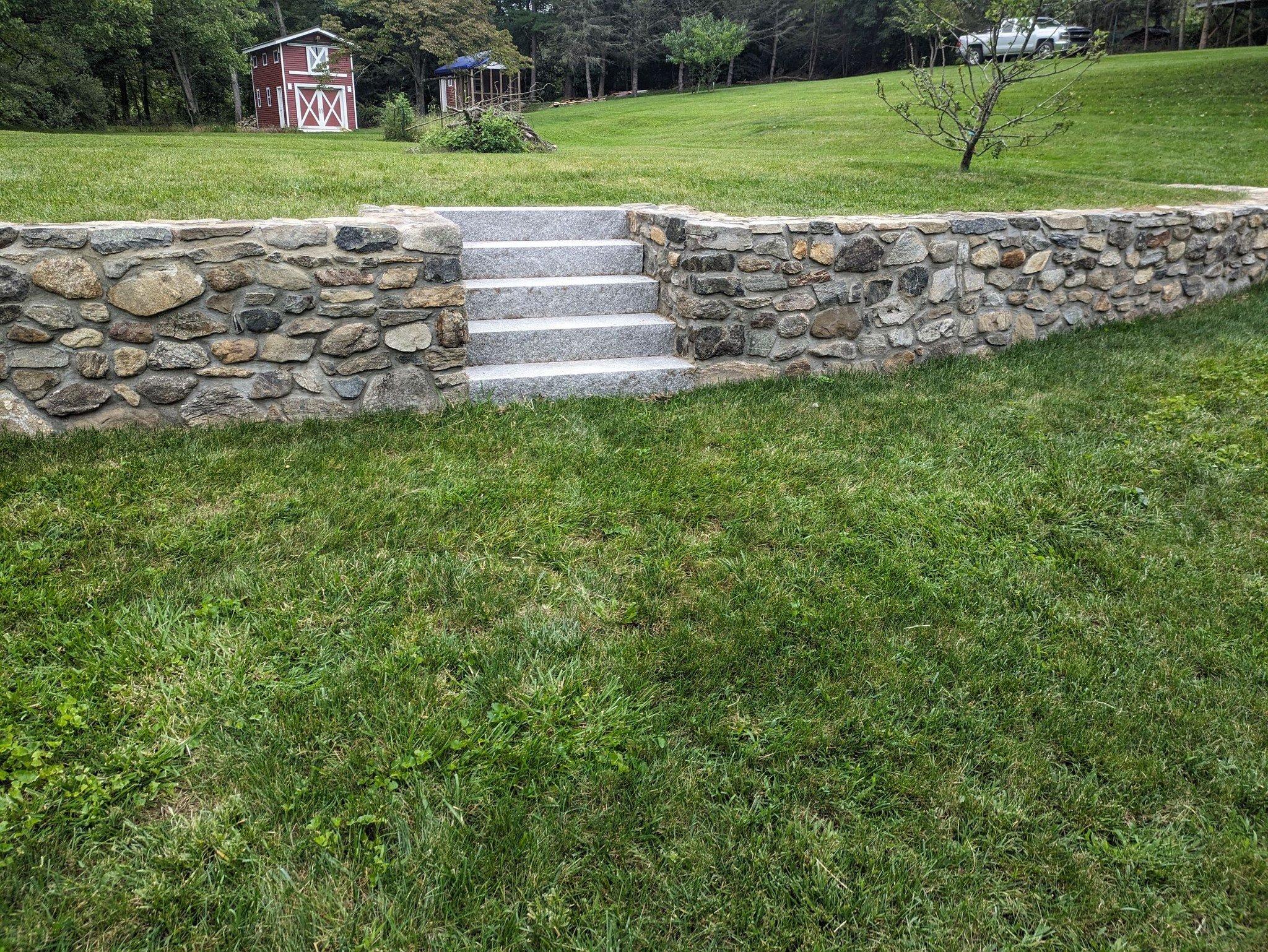 fieldstone wall with granite steps