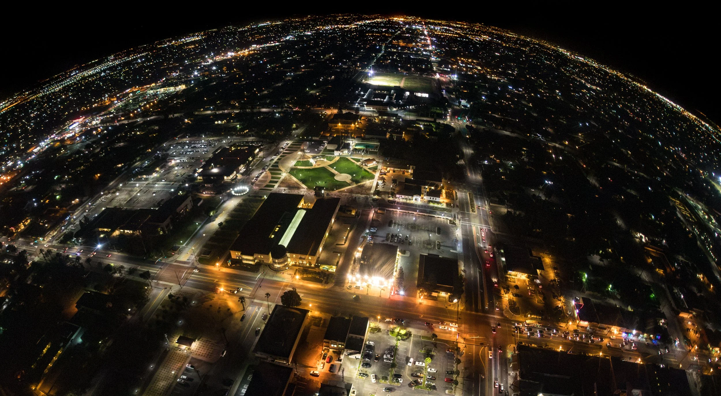 Looking down at the city lights from a helicopter