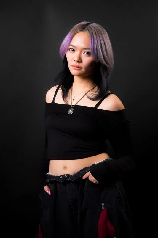 Kanon Tabuchi, a Japanese-American Hip Hop dancer and choreographer, smiling in a professional headshot.