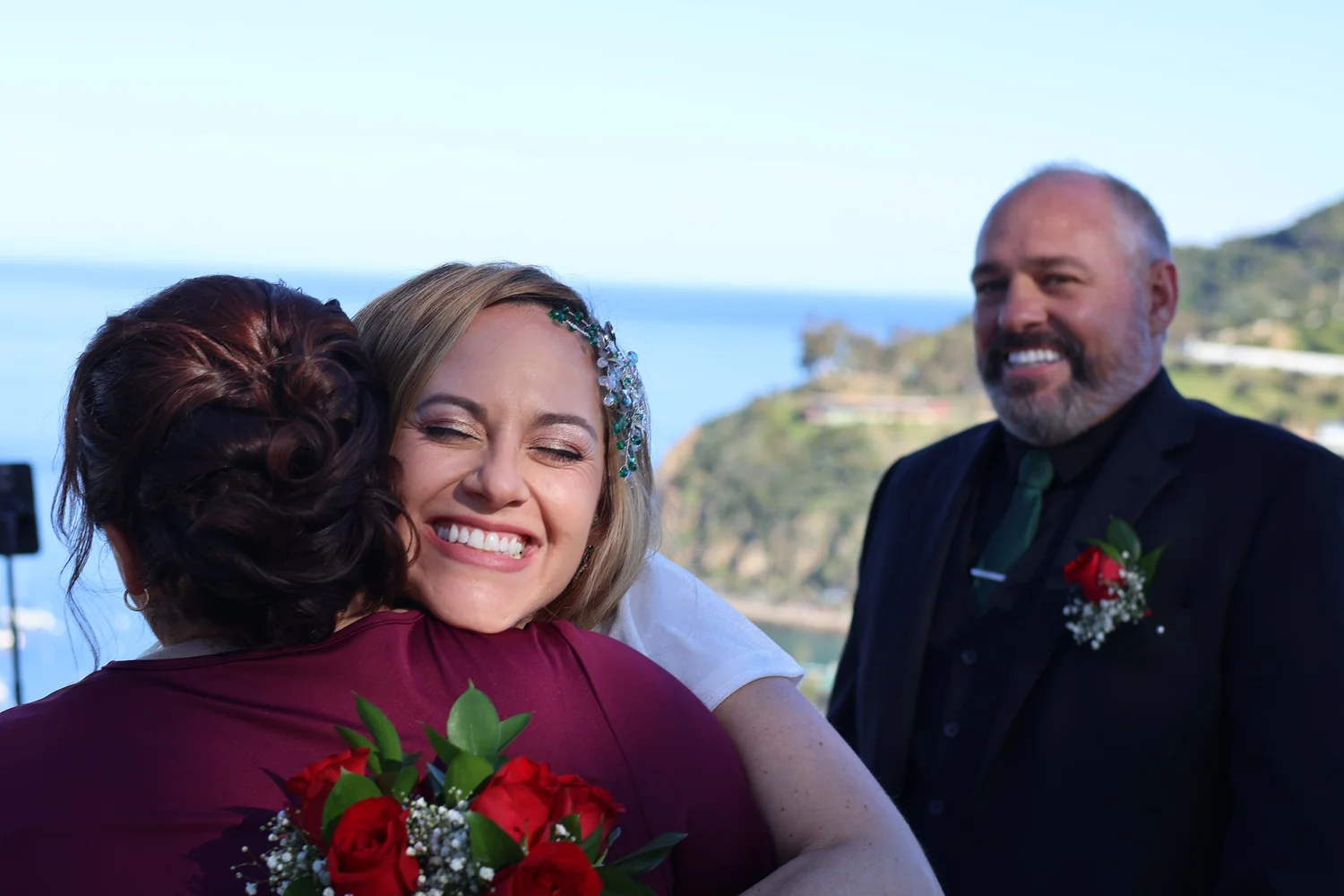 A bride embracing a guest after the ceremony