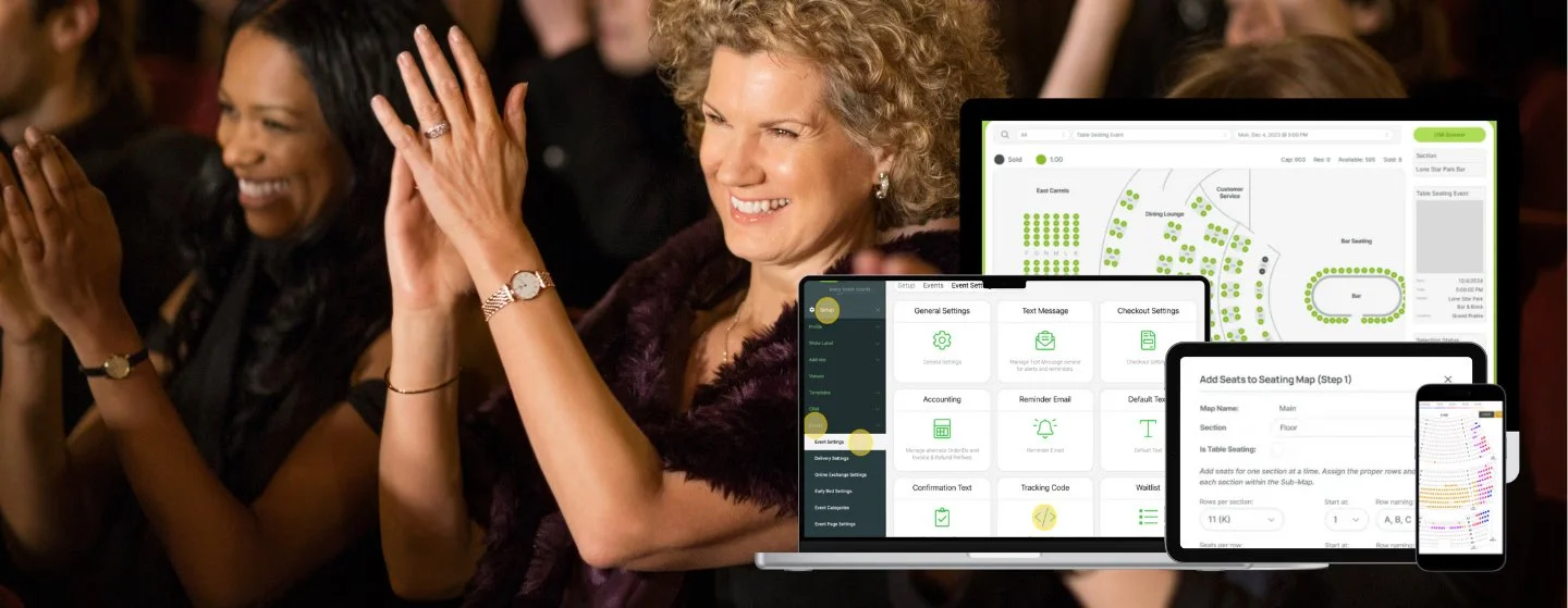 Women laughing and clapping at a live event, with laptop and mobile devices in the foreground showing digital seating and layout tools.