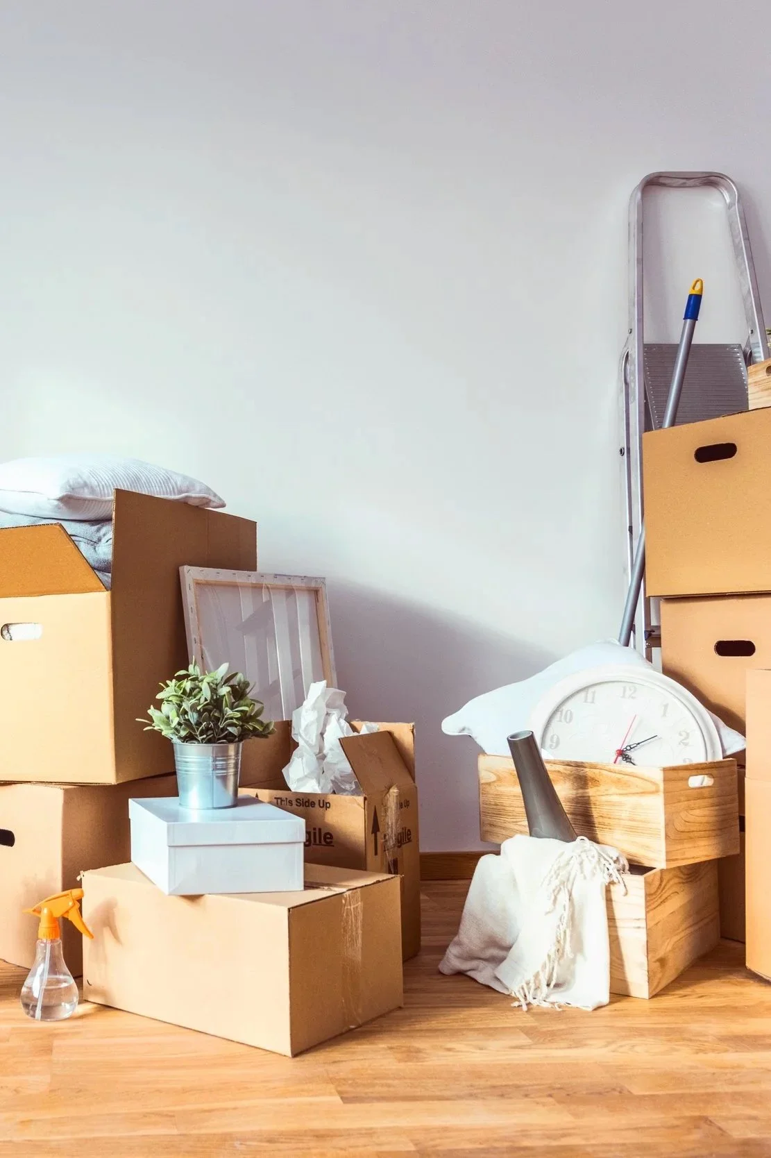 Packed moving boxes and household items prepared for a residential move — The Good Move Denver metro moving services.