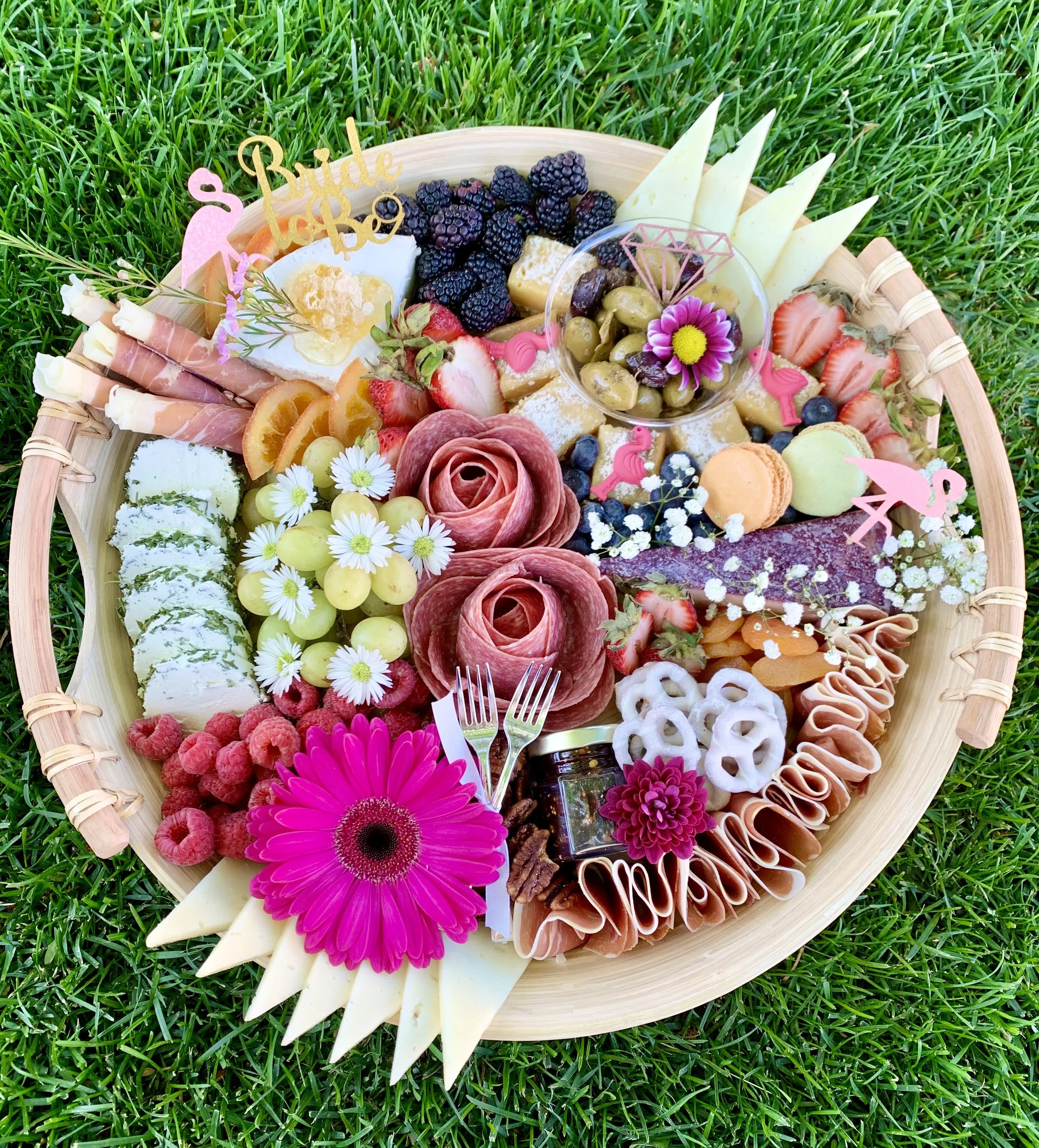 Built for a bachelorette weekend. Custom toppers and color styling by request.