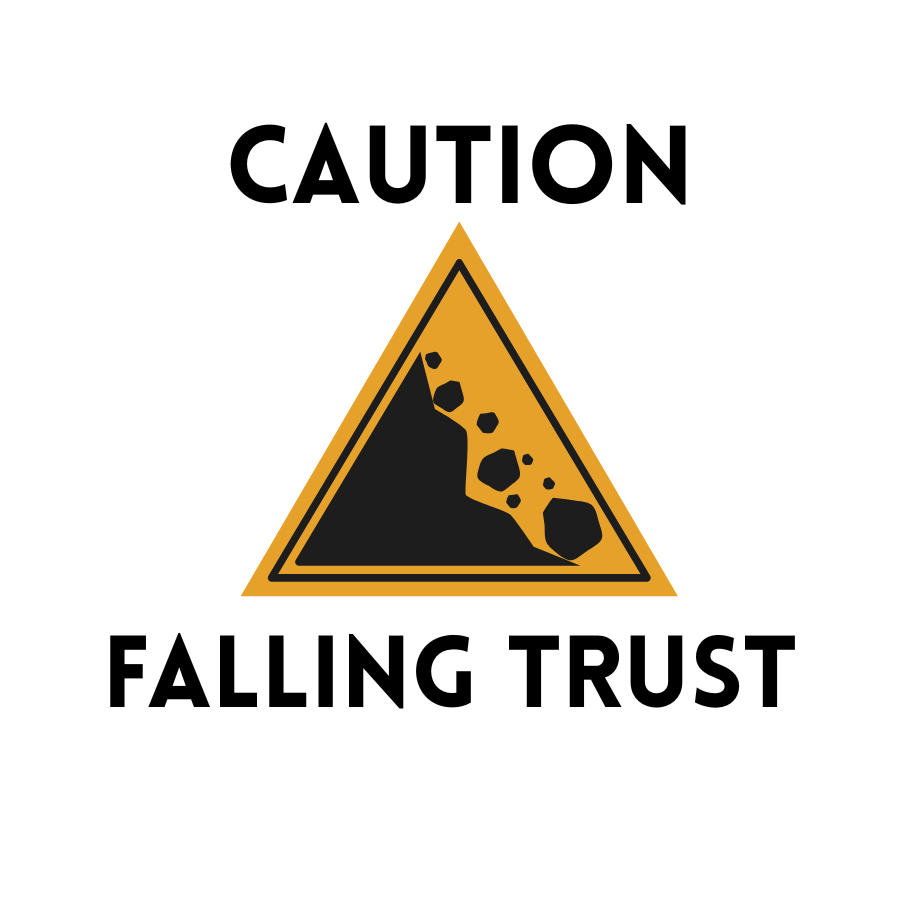 Warning sign with a falling rock symbol and the text "Caution Falling Trust".