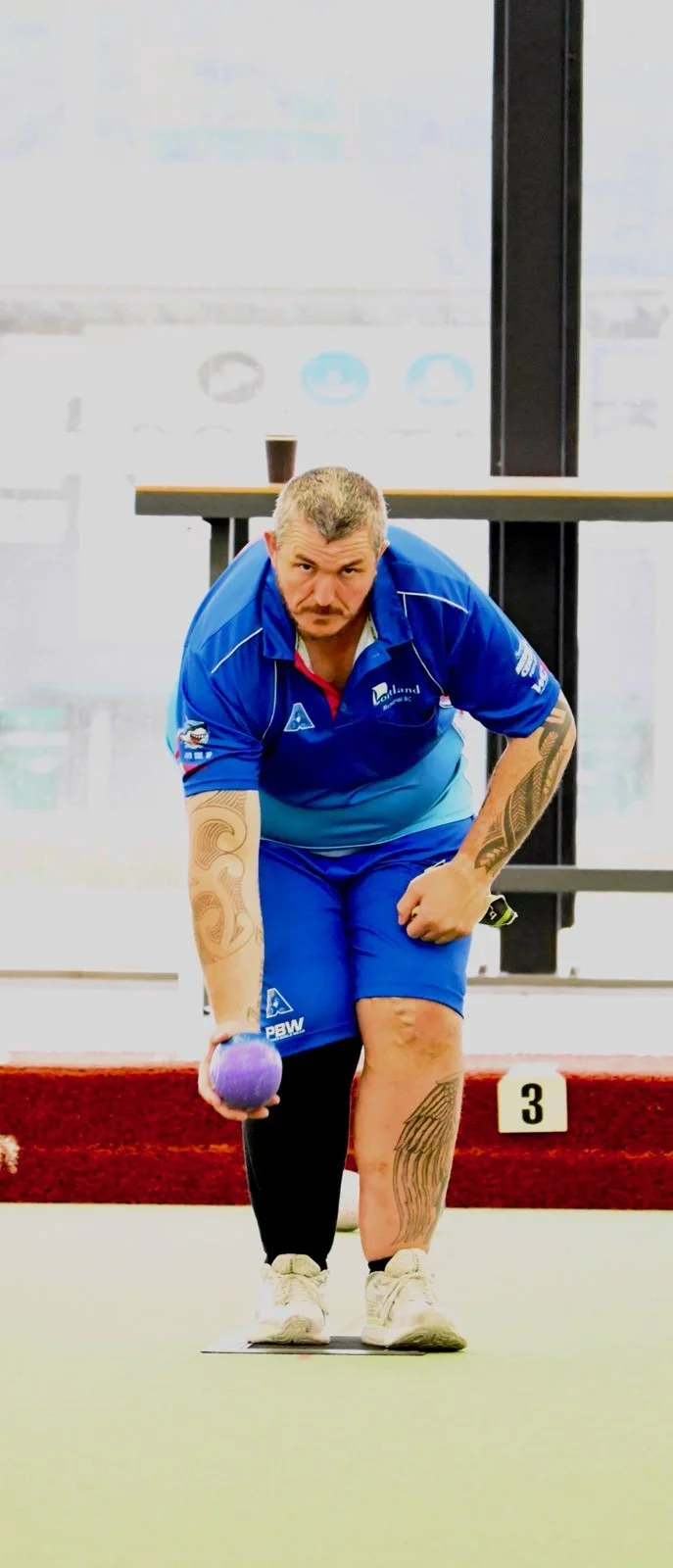 A bowler holding a bowl