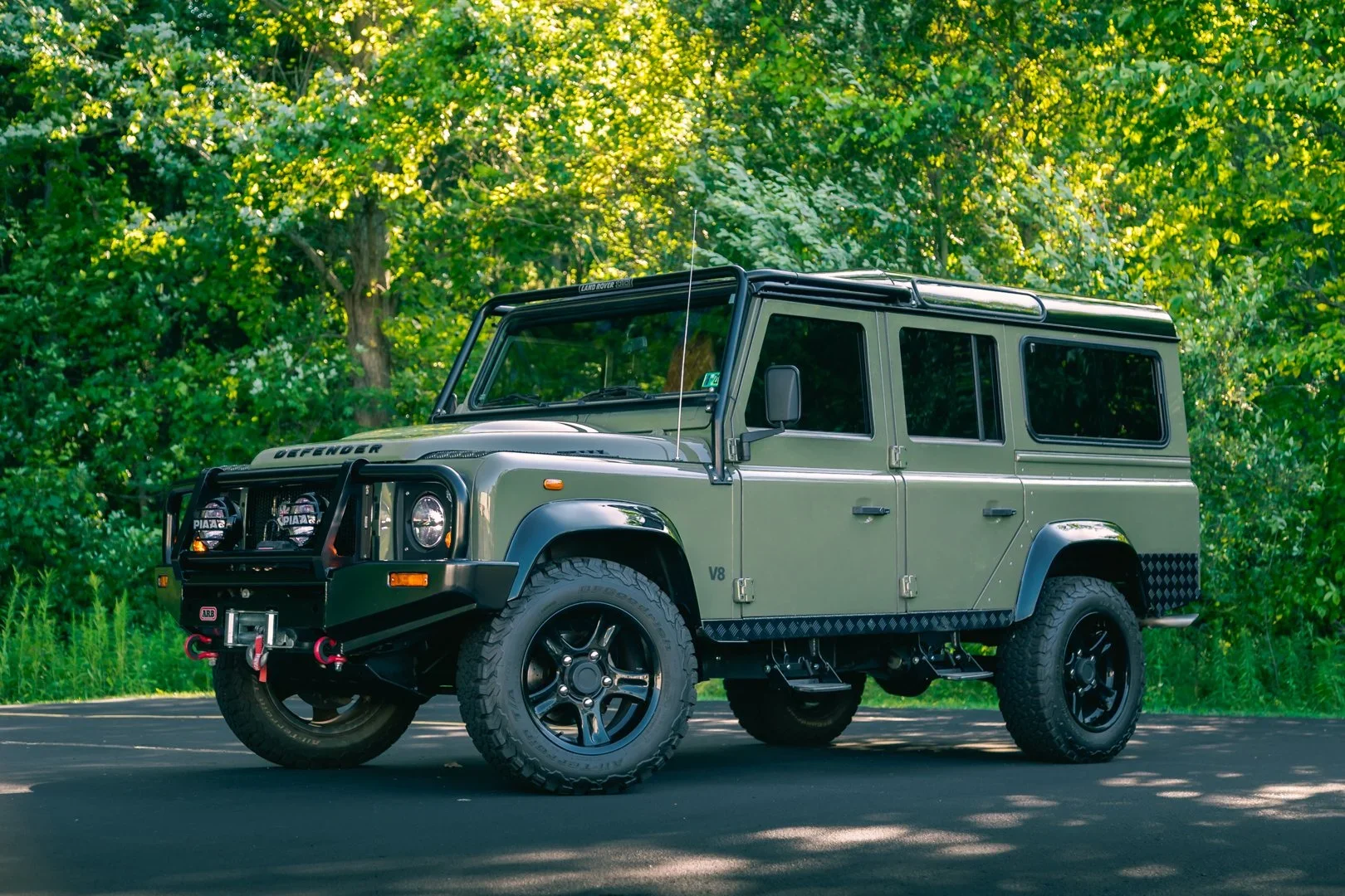 Green Land Rover Defender 110 off-road vehicle featured in The Terminal List season 2 teaser trailer