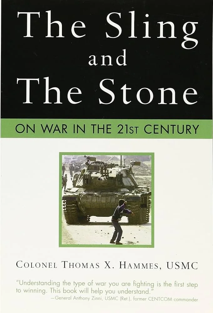 The Sling and the Stone: The Sling and the Stone by Thomas X. Hammes book cover featured in The Terminal List intro garage