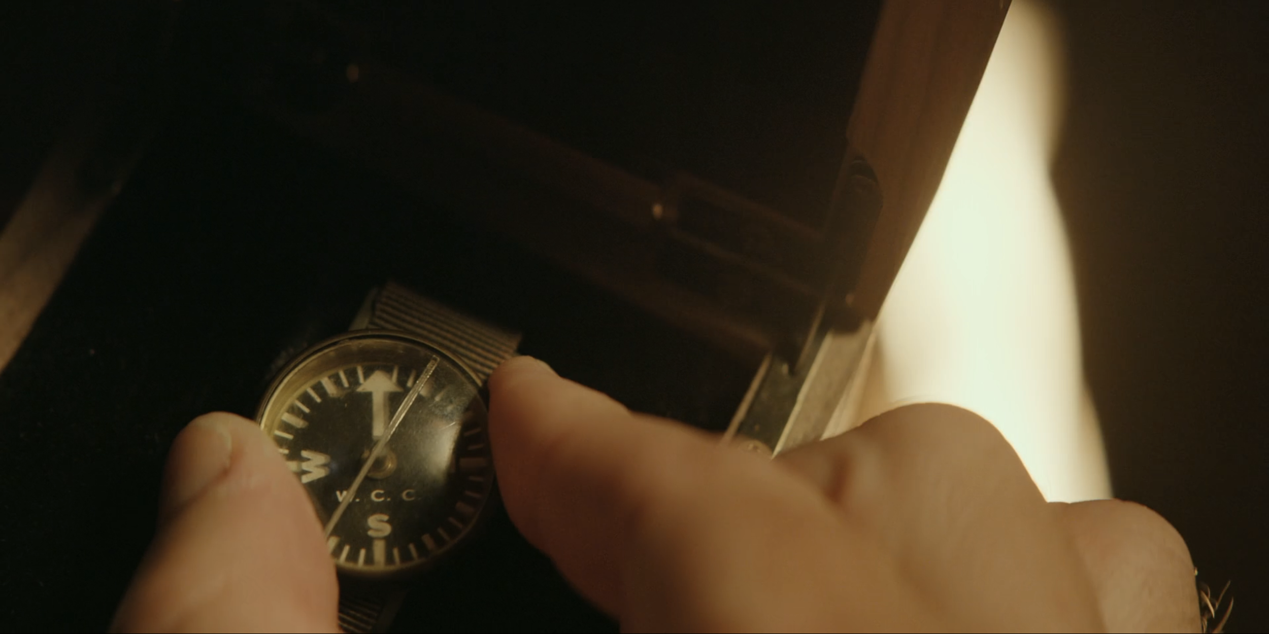 The wrist compass seen The jacket Ben Edwards(Taylor Kitsch) wears in The Terminal List: Dark Wolf Episode 1