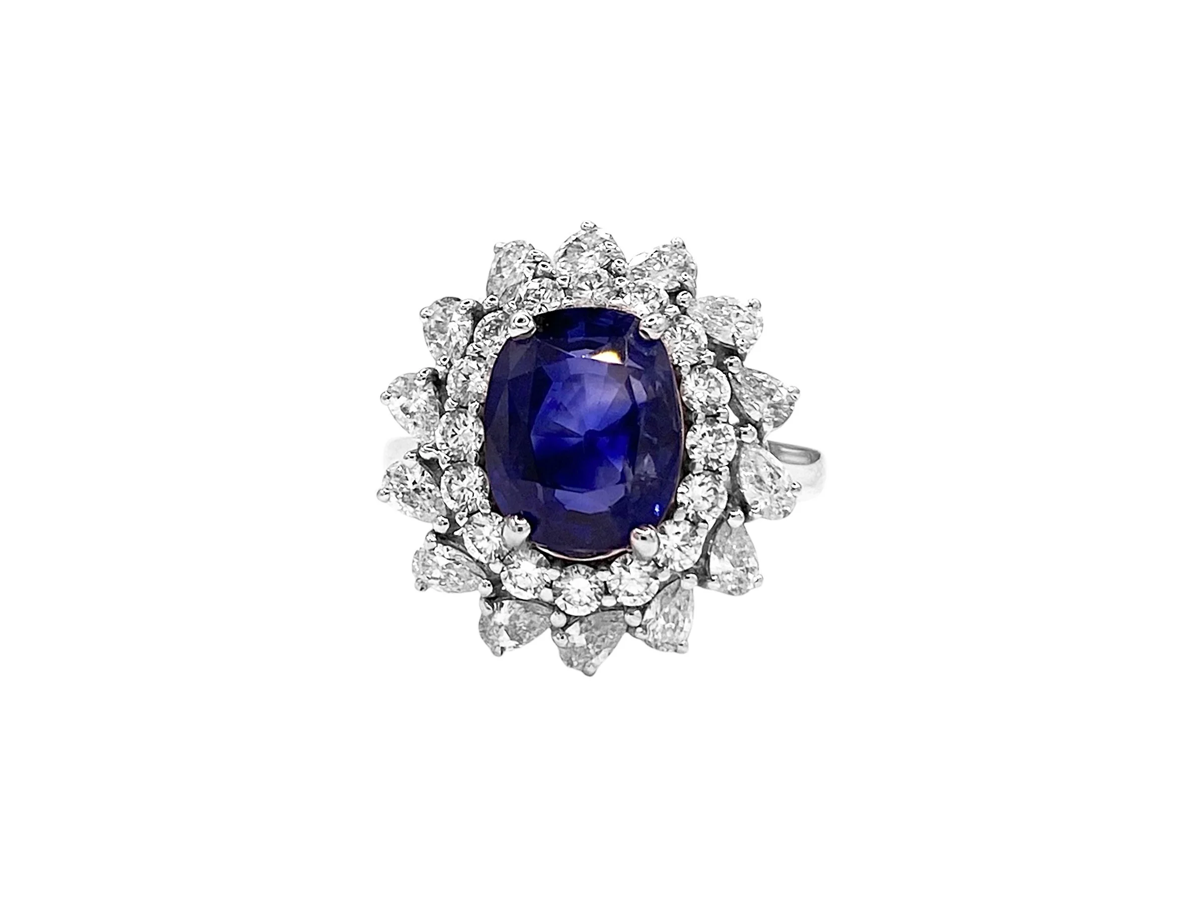 6.54 Carat Royal Blue Sapphire(Not Heated) and Diamond Halo Ring in 18k White Gold