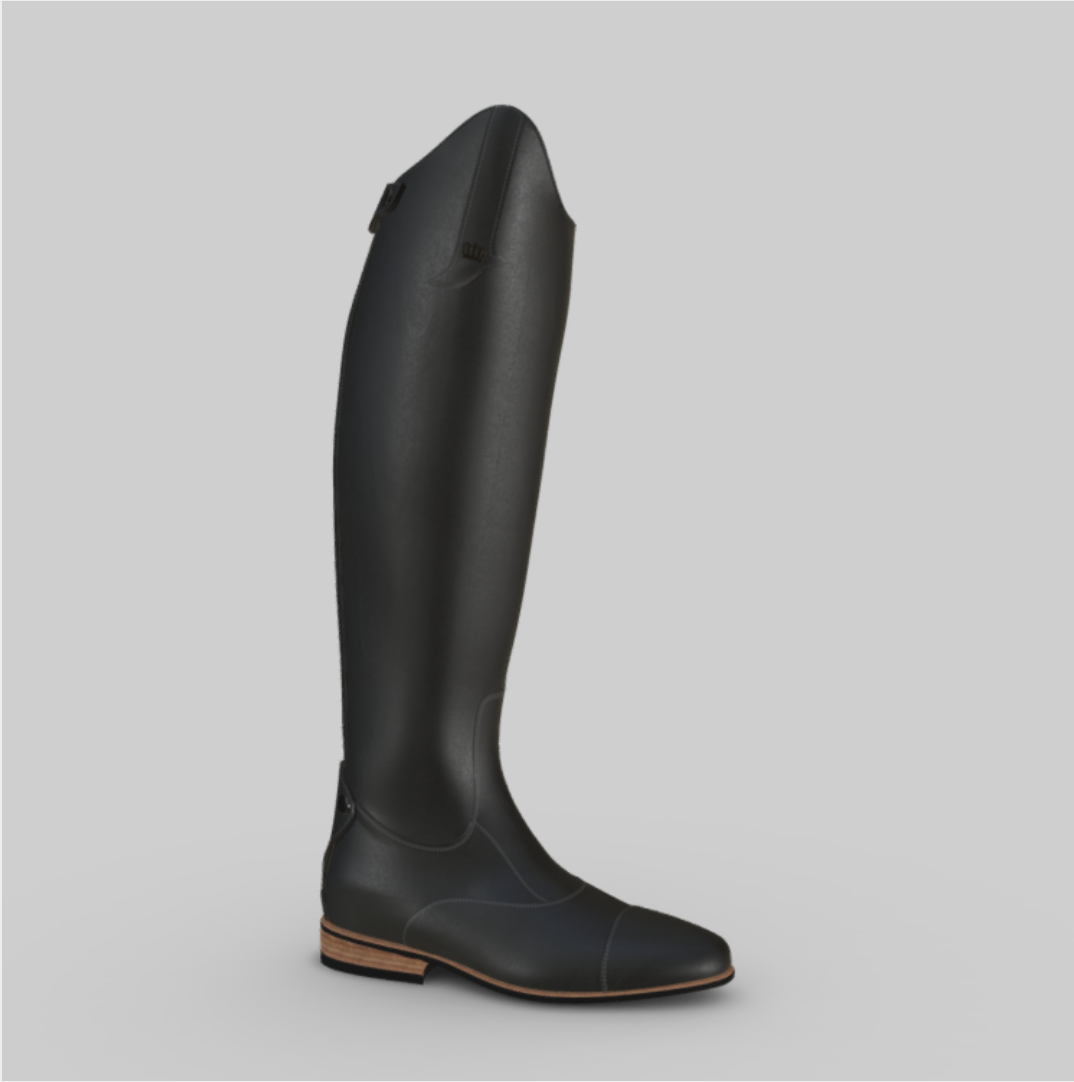 A black riding boot with a low heel and a sleek design, standing upright on a light gray background.