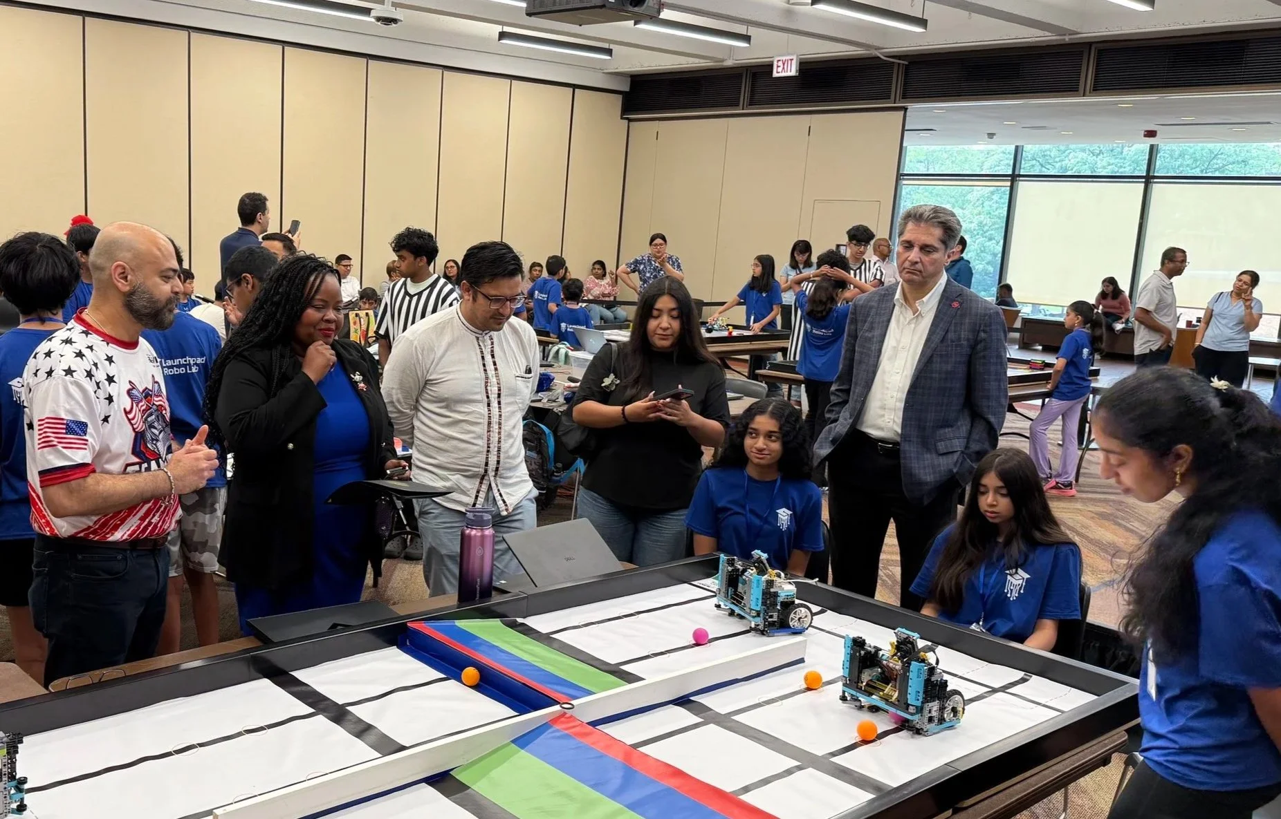 Illinois State Senator Lakesia Collins with competing students at the WRO Chicago Open Qualifier 2026