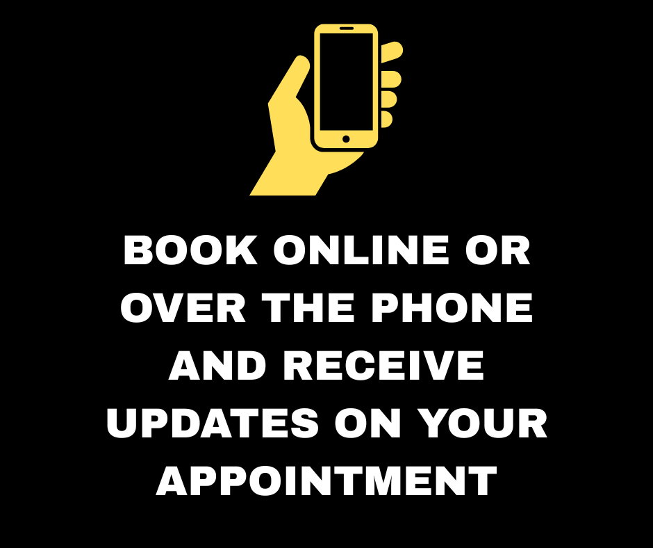A yellow hand holding a smartphone with a black screen, against a black background. White text beneath the graphic reads: 'Book online or over the phone and receive updates on your appointment.'