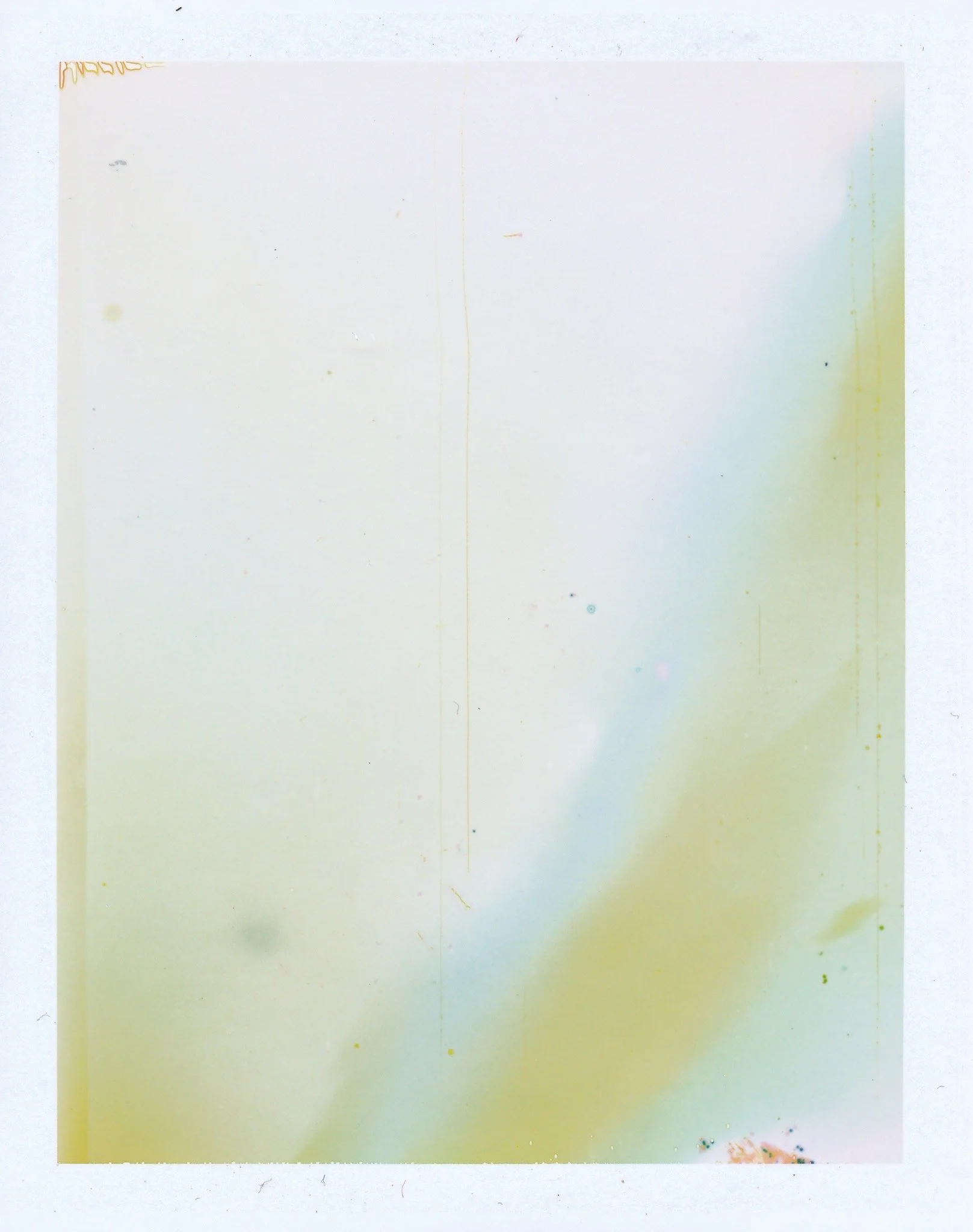 Polaroid film photographic art print with artifacts and color fields.