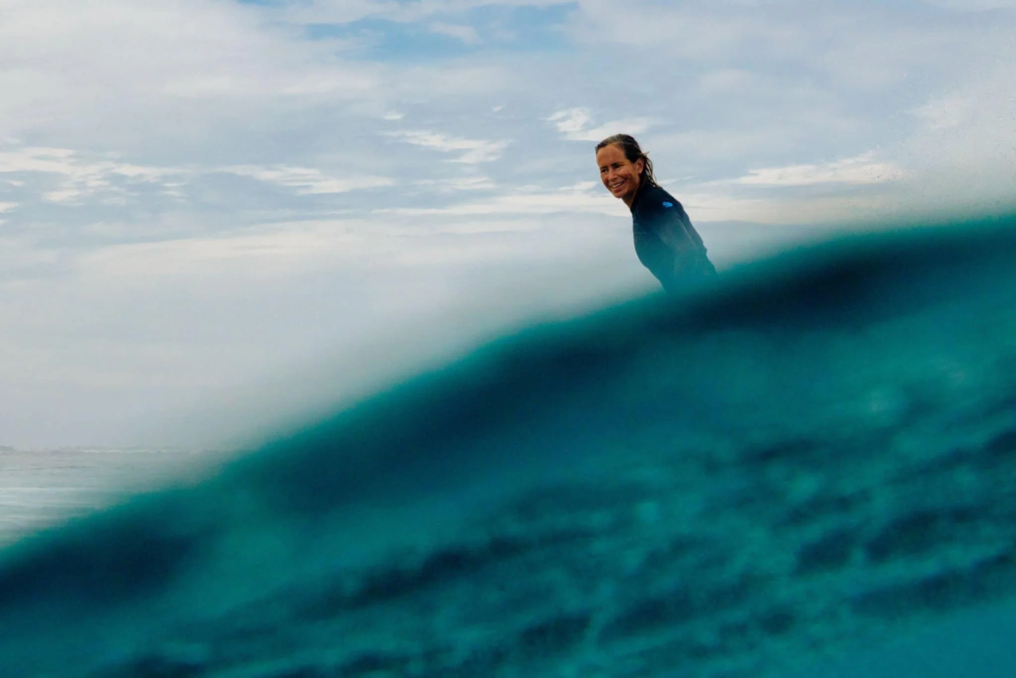 Surfing Through Perimenopause: Finding Strength, Calm and Joy in the Waves