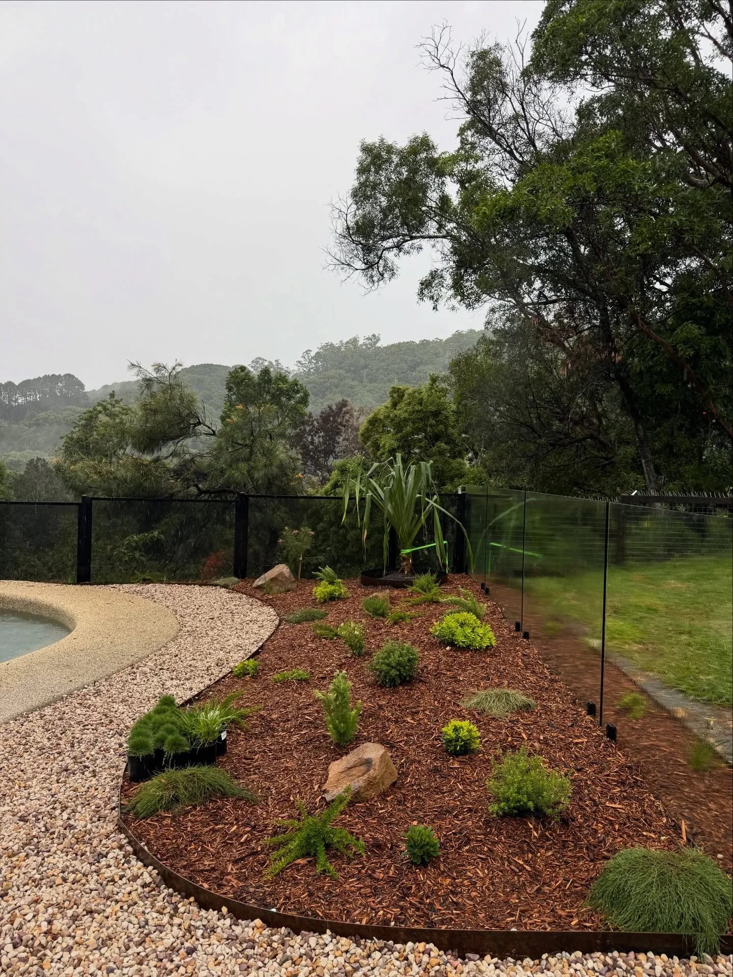 Update from Currumbin Creek Rd 📍
Native plants, Corten steel edging, Irrigation, Mulch and Sandstone pebbles are in!
Travertine Crazy paving &amp; Steppers still to come.
Perfect way to close off this beautiful project and begin an amazing 2026
Stay