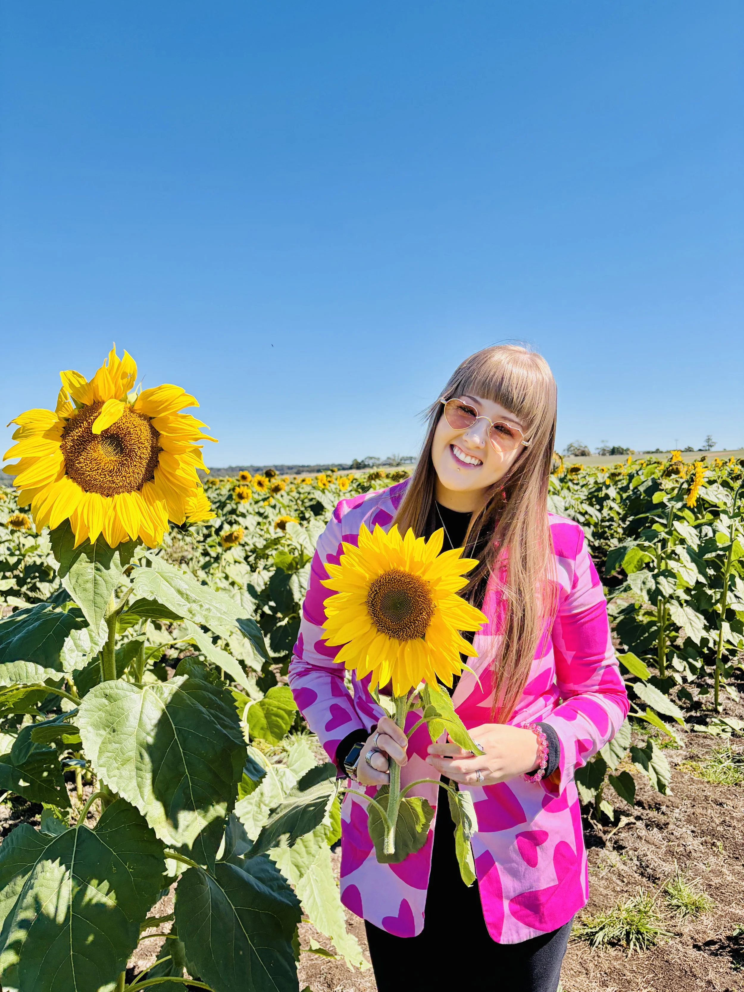 Laurie’s customers, Fernando and Kate embracing by the lake on their wedding day.