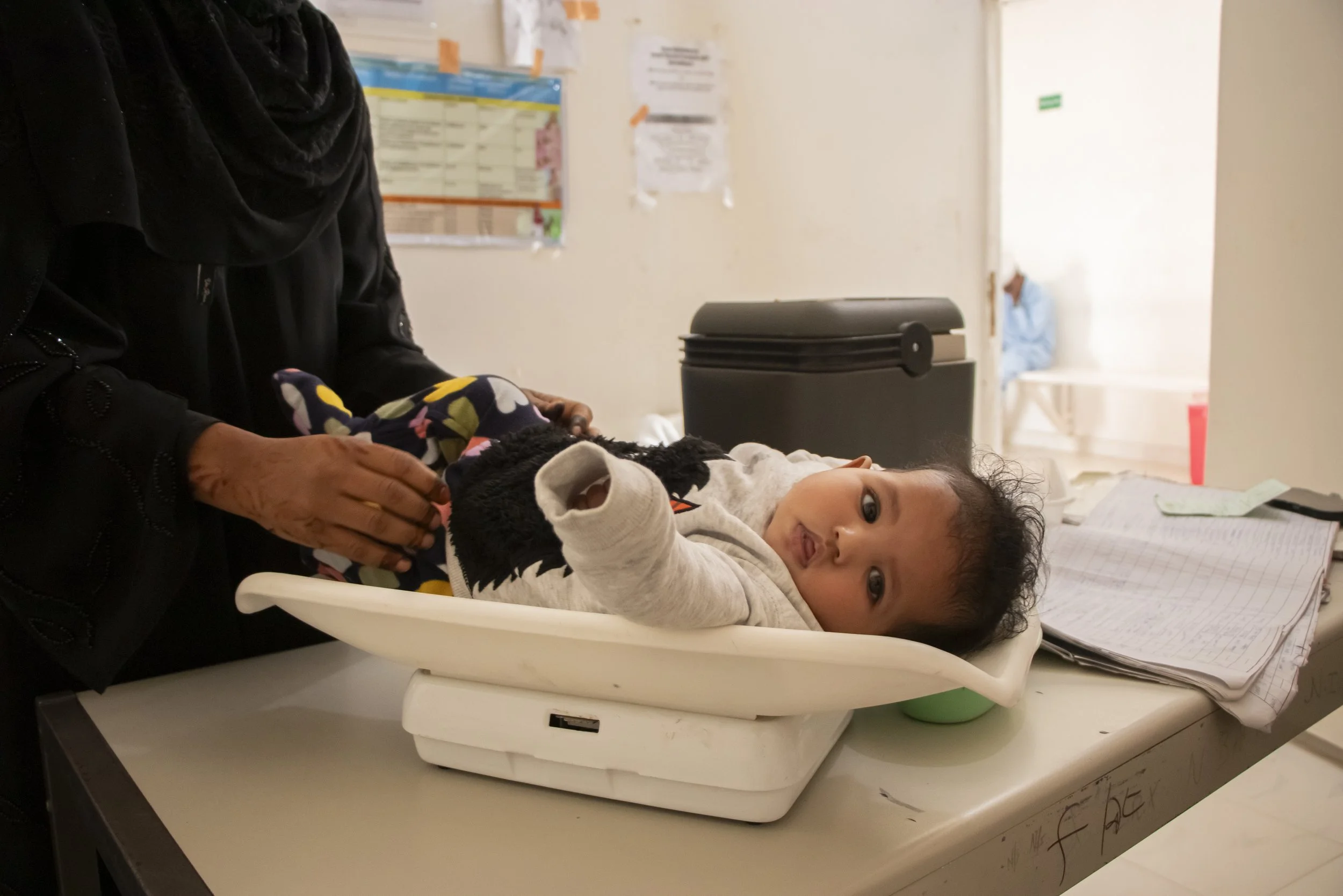 baby being weighed.JPG