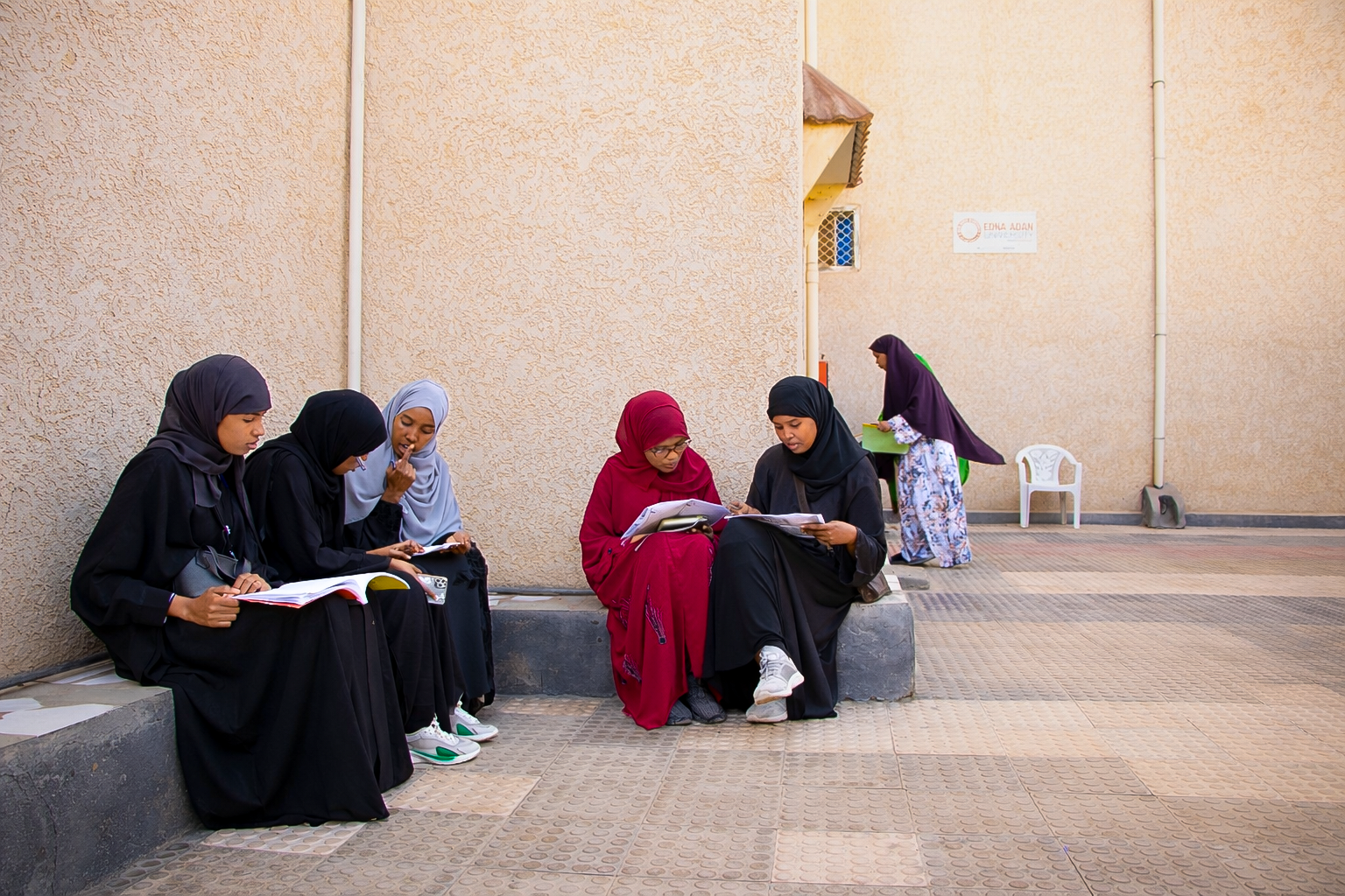 students outside uni.PNG