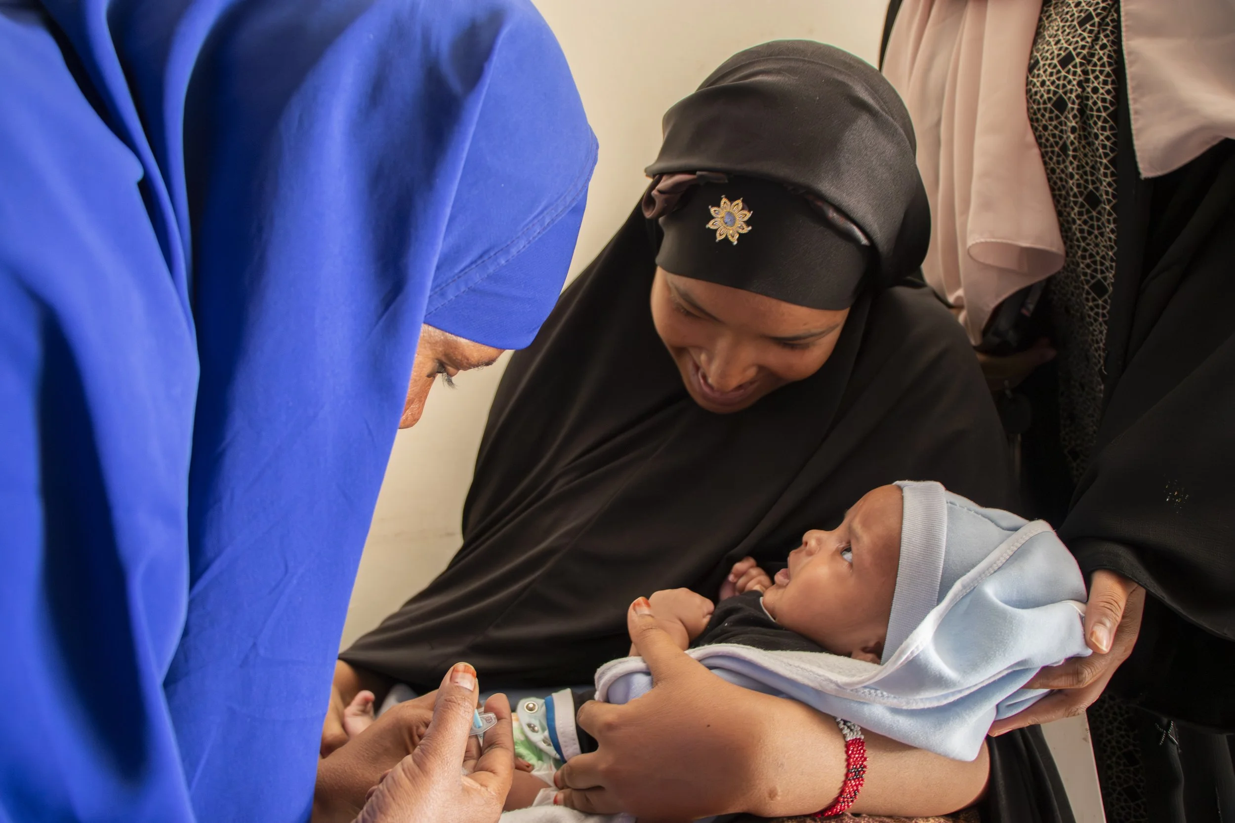 Patient nurse and baby.JPG