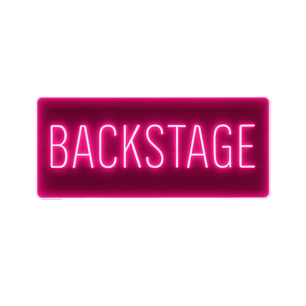 Neon pink sign reading 'BACKSTAGE' against a black background.