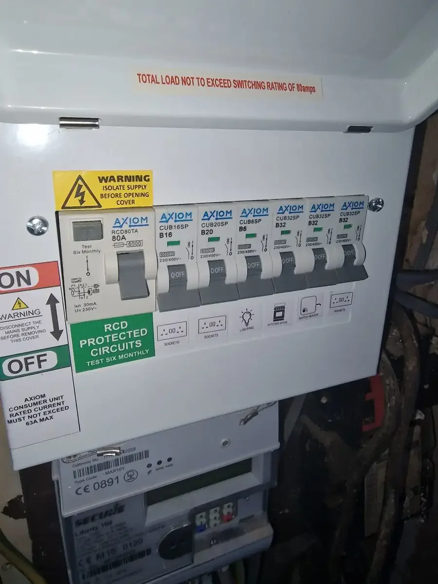 consumer unit Axiom, first from left rcd 80A 30ma in off position next 16A mcb.