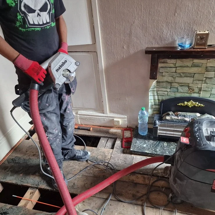 Birkenhead electrician working on home rewire, using Metabo Wall chaser set