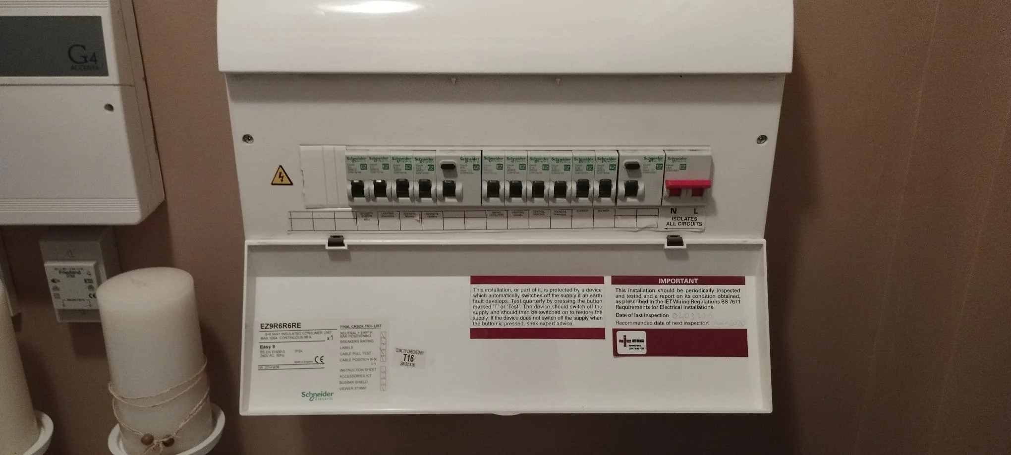 1. Before inspection: the consumer unit with its front cover fitted. The homeowner reported a smell and buzzing.