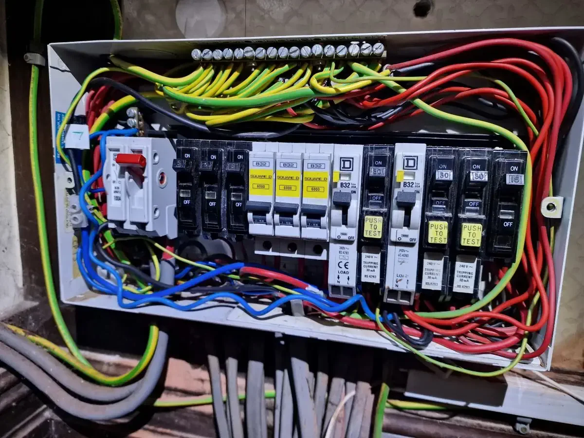 consumer unit from inside visible cable connections, old types of rcd and mcb