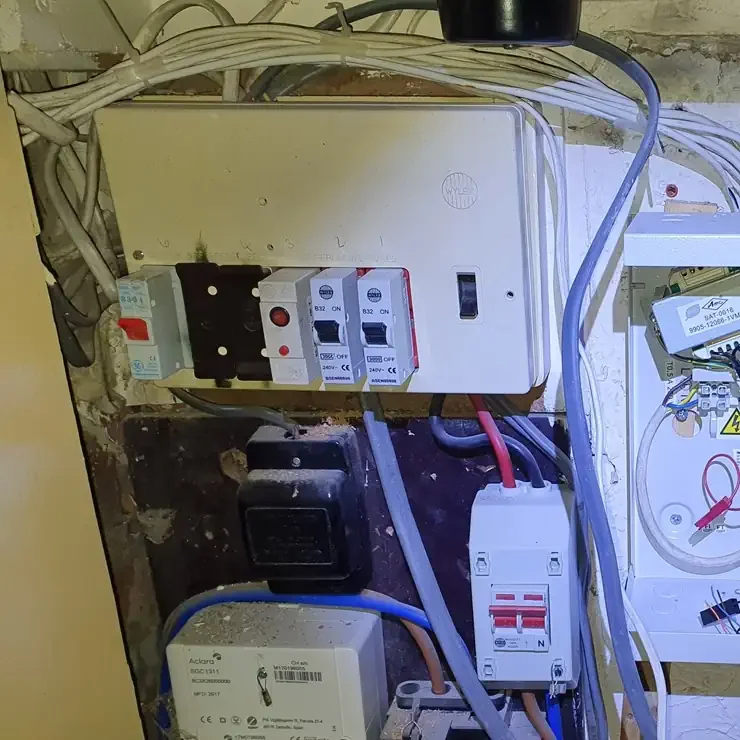 Burn marks at fuse carriers indicate severe overheating, loose terminal connections, or electrical arcing, which are immediate fire hazards