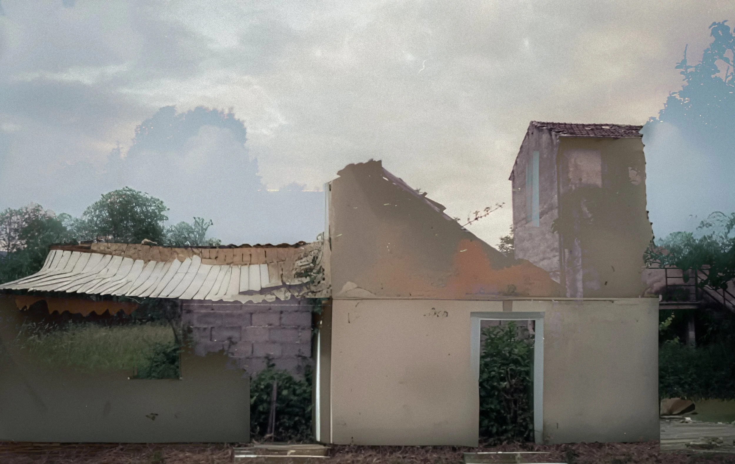 dilapidated houses - a couple of buildings sitting next to each other.jpg