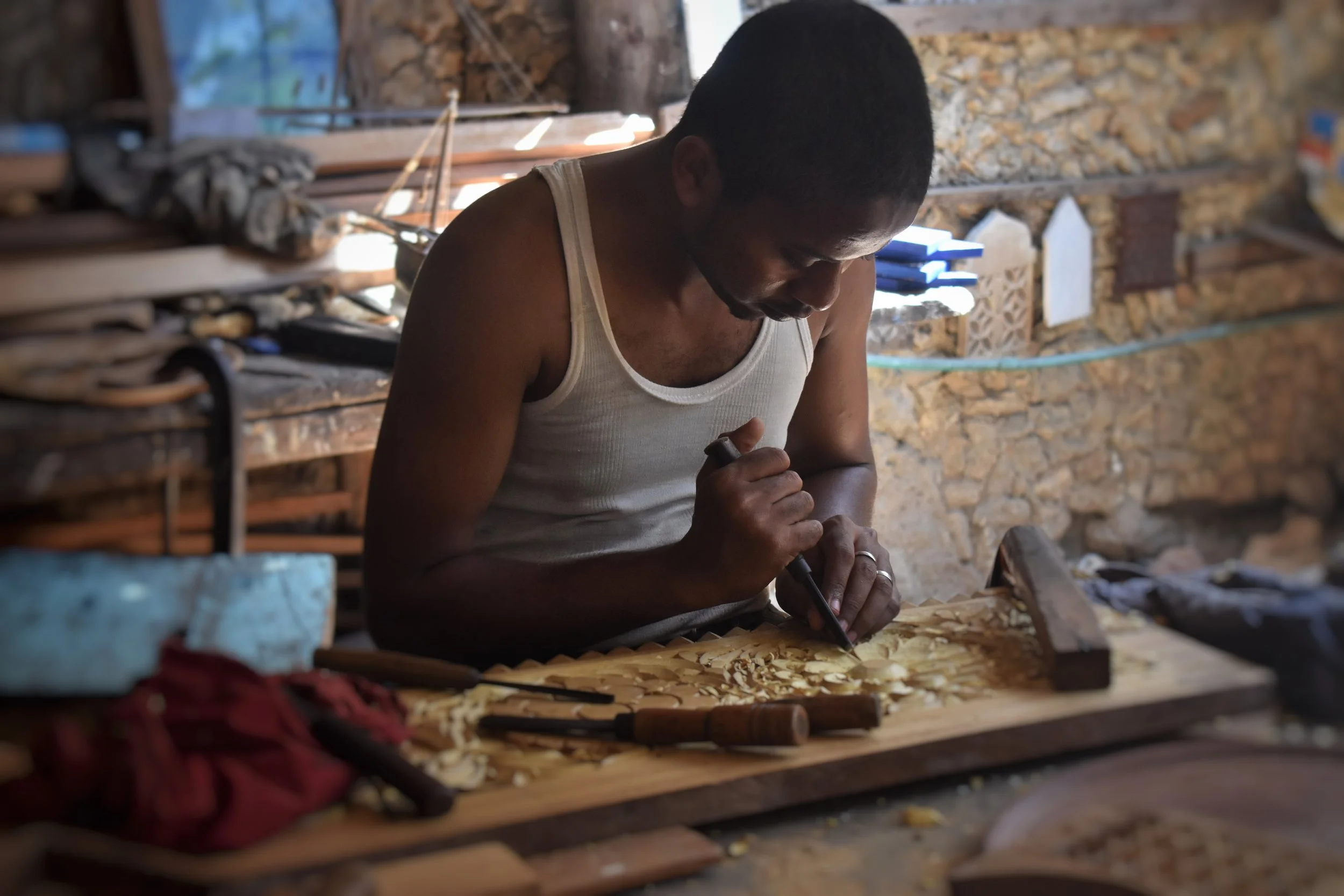 Man doing woodwork with tools