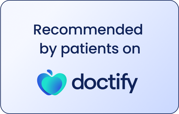 Sign with text 'Recommended by patients on Doctify' and a heart-shaped logo with blue and green colors.