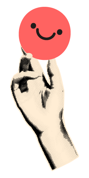 A hand holding a pink happy face with a smiling expression.