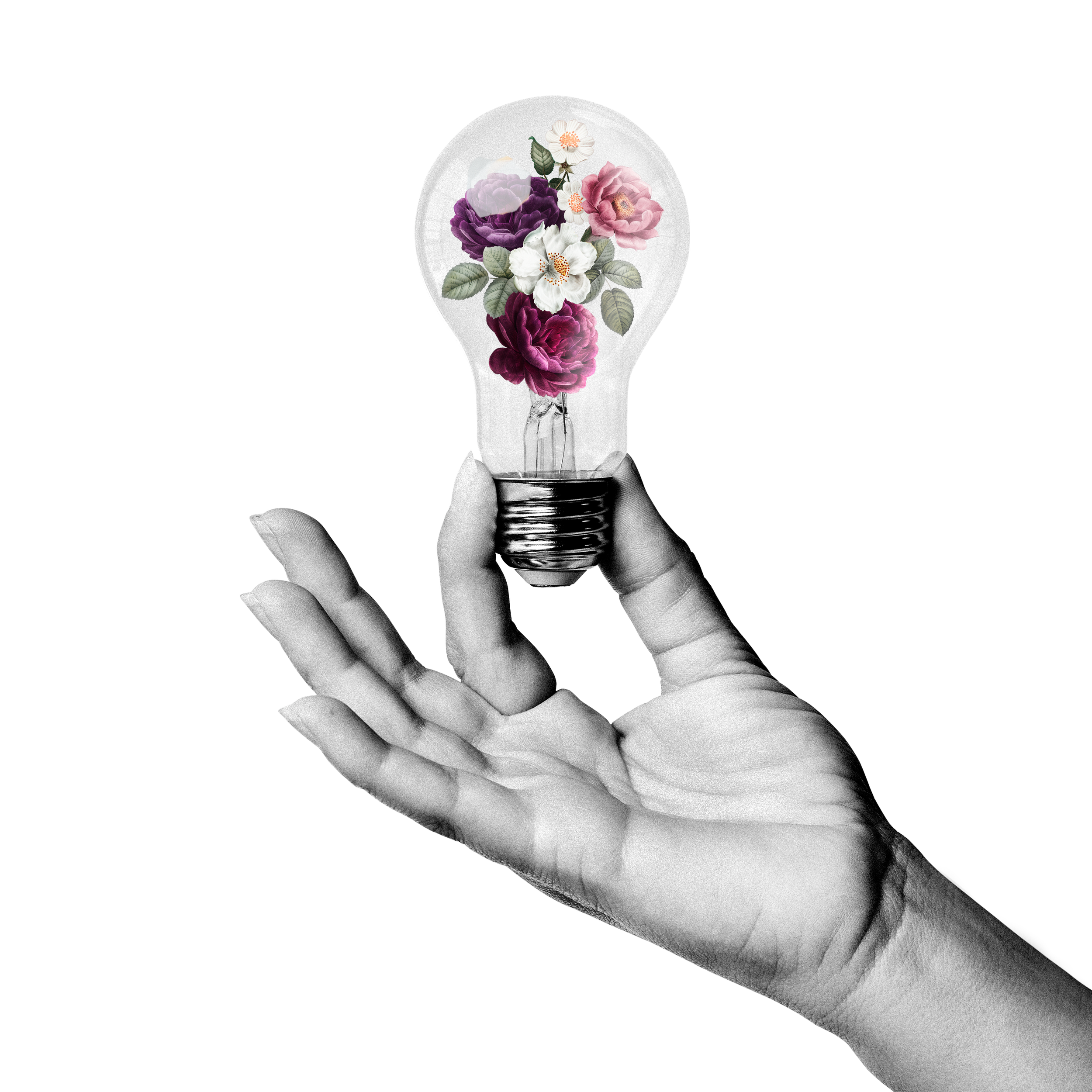 A black and white hand holding a lightbulb with flowers inside it.