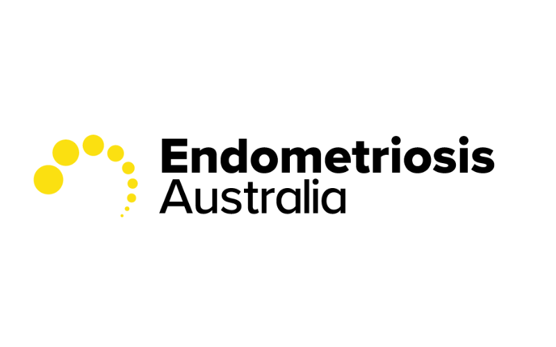 Logo of Endometriosis Australia featuring a yellow dot spiral and black text.