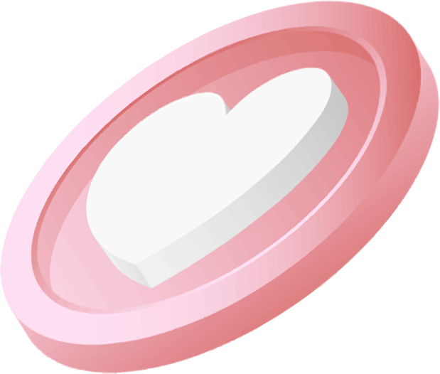 Close-up of a pink and white round tablet or lozenge.