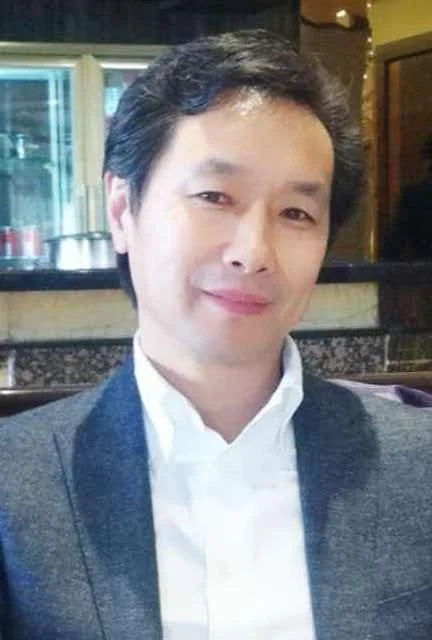 Yin Chunyuan, founder of Shi Yuan Suit Factory