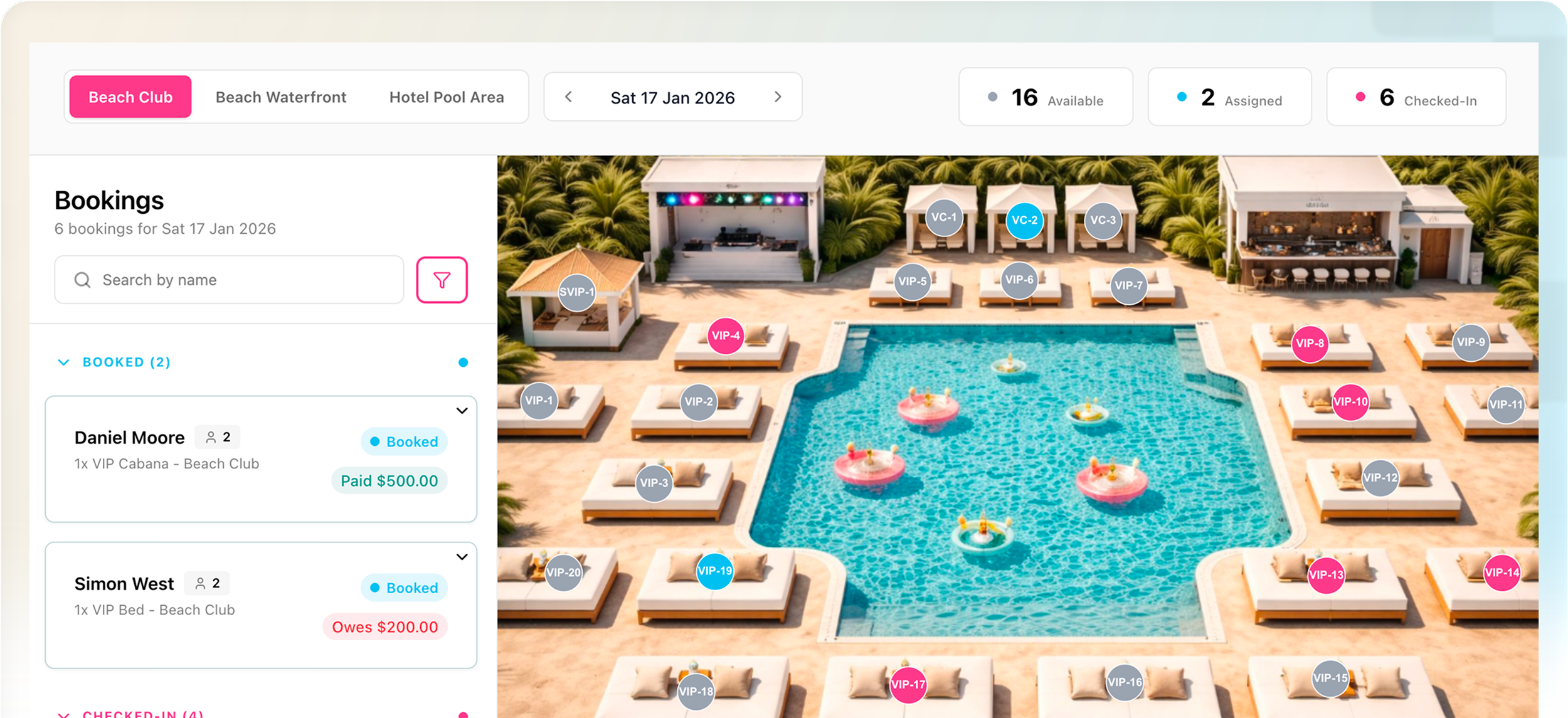 Aerial view of a beach club pool area with sun loungers labeled VIP and VC, surrounded by lush greenery, with floating pink and yellow inflatable rings in the pool, and various seating and pavilion areas.