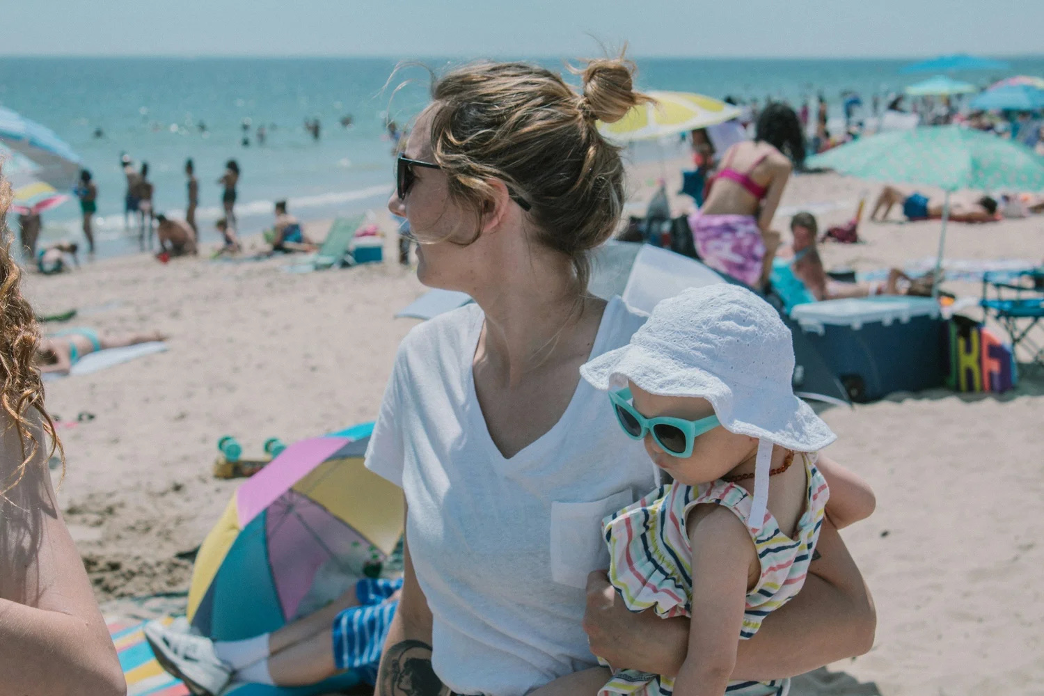 Mother spending time with her child at the beach