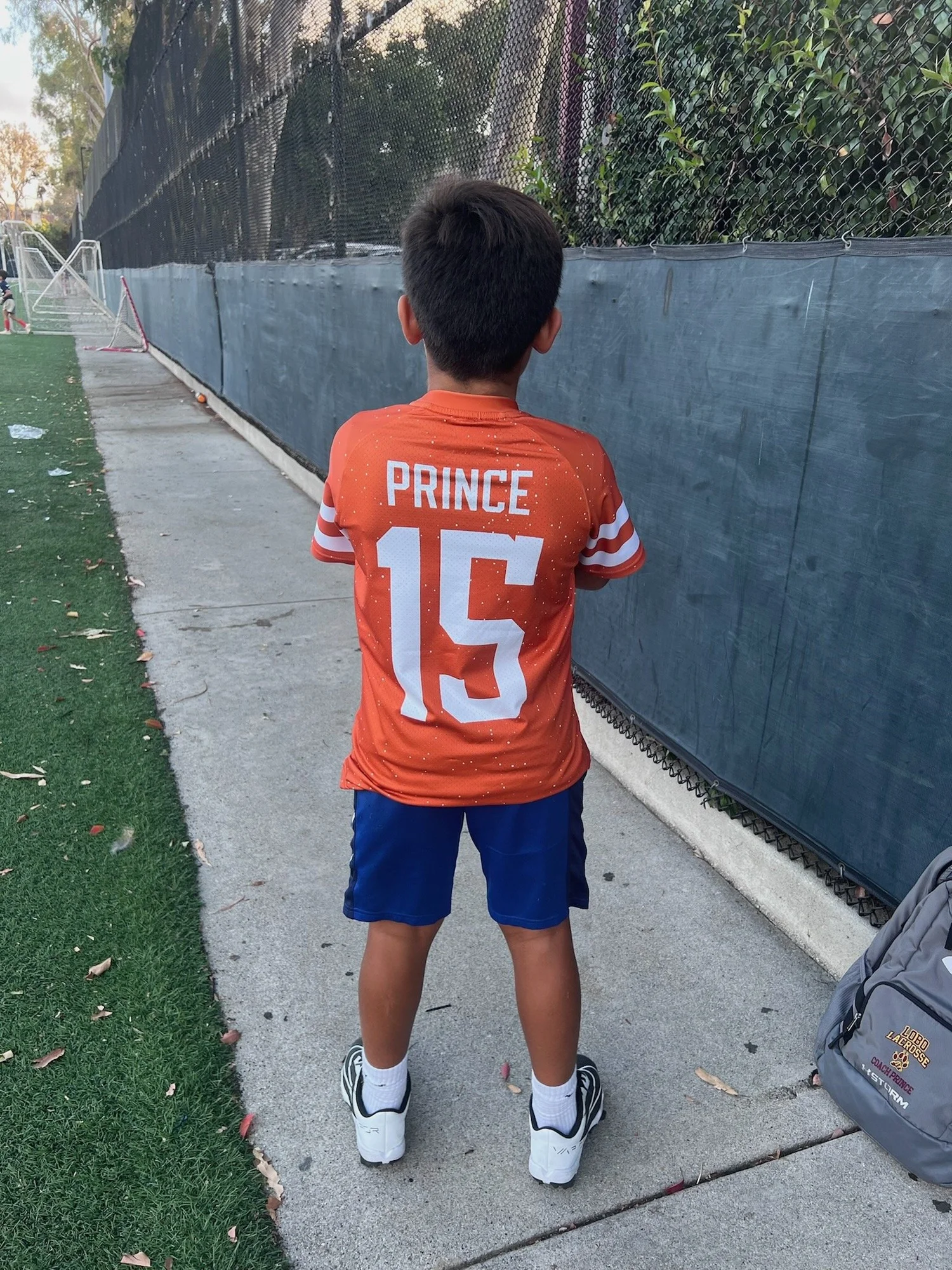 Youth athlete wearing a sports jersey